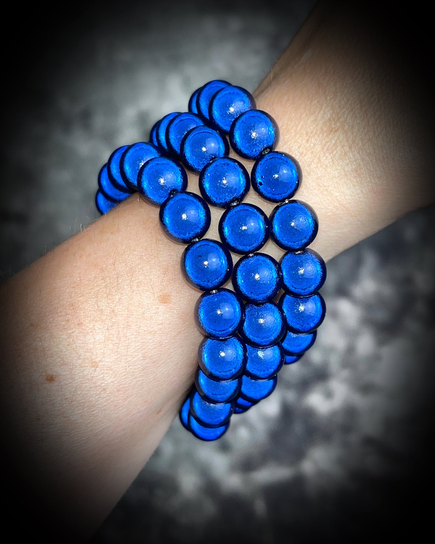 Colorful Eclipse bracelets from Become Spellbound! Magical illusion bracelets for stacking, parties, summer jewelry, festivals, raves, travel jewelry and more! Gift for her, navy blue beaded bracelet.