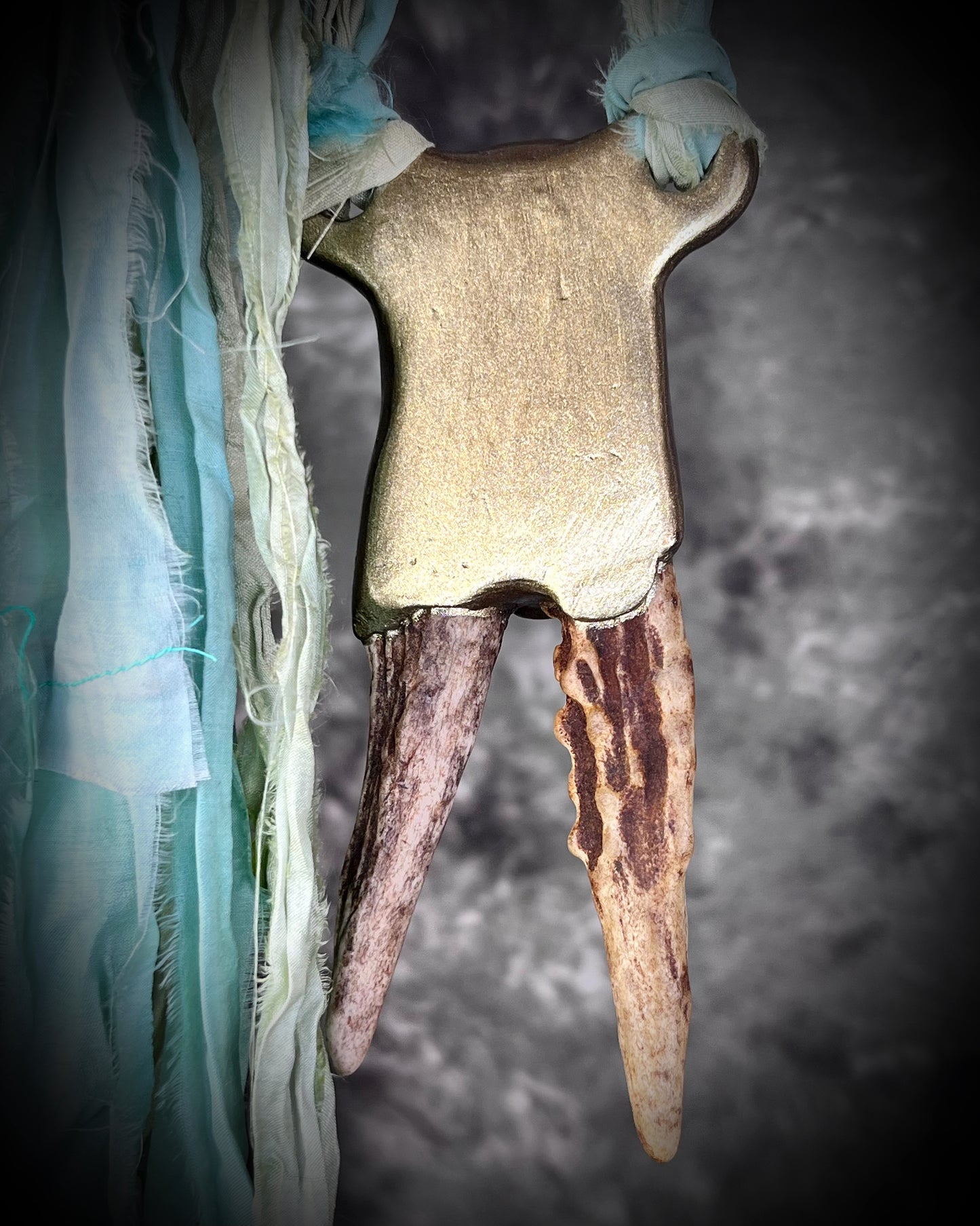 Shamanic jewelry for the boho spirit! Handmade antler, prehnite heart chakra crystal and green tourmaline healing gemstone talisman. Call your spirit guides with this eco-friendly pendant hung from recycled silk.