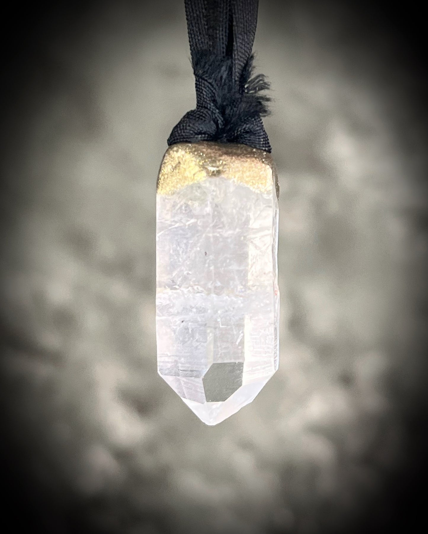 Quartz crystal charm in gold on black recycled silk. Bag or purse charm, anklet or bracelet, car crystal, summer vacation , beach or bra crystal. Versatile take-anywhere everyday magic.