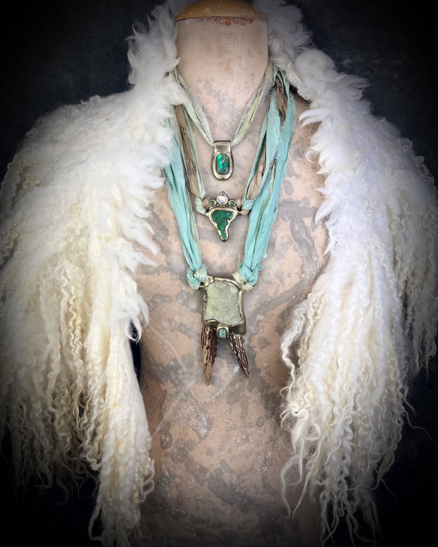 Shamanic jewelry for the boho spirit! Handmade antler, prehnite heart chakra crystal and green tourmaline healing gemstone talisman. Call your spirit guides with this eco-friendly pendant hung from recycled silk.