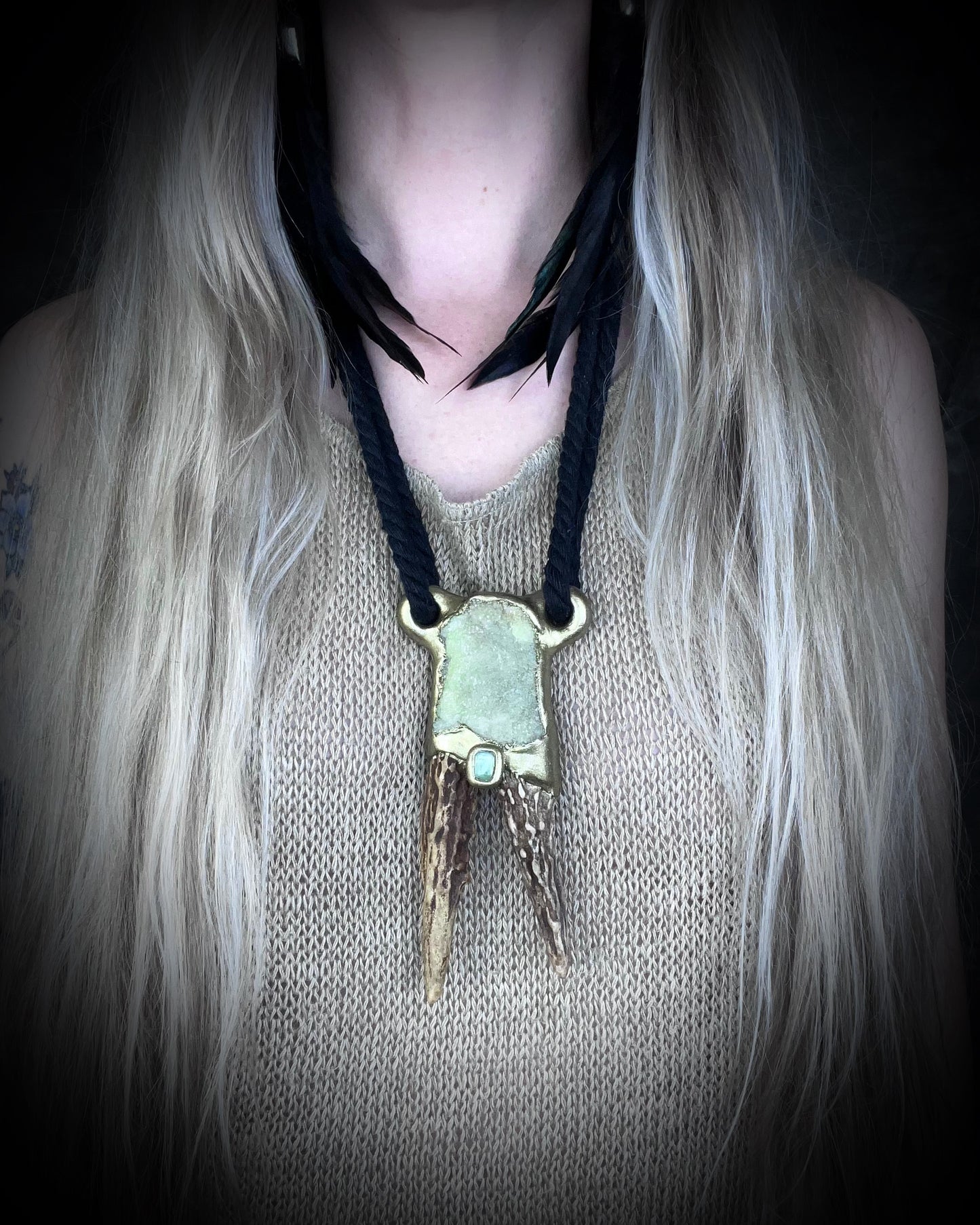 Shamanic jewelry for the boho spirit! Handmade antler, prehnite heart chakra crystal and green tourmaline healing gemstone talisman. Call your spirit guides with this eco-friendly pendant hung from recycled silk.