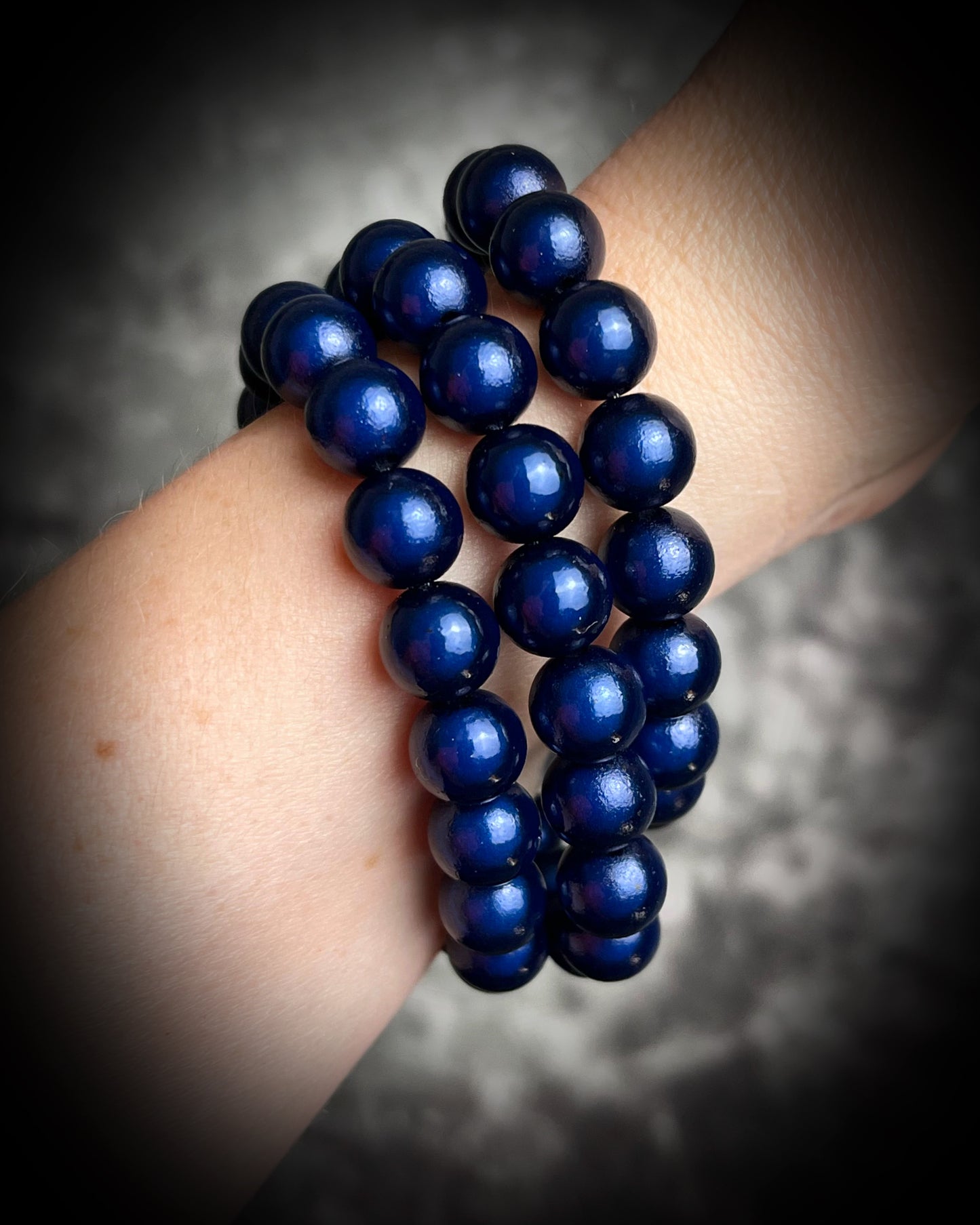 Colorful Eclipse bracelets from Become Spellbound! Magical illusion bracelets for stacking, parties, summer jewelry, festivals, raves, travel jewelry and more! Gift for her, navy blue beaded bracelet.