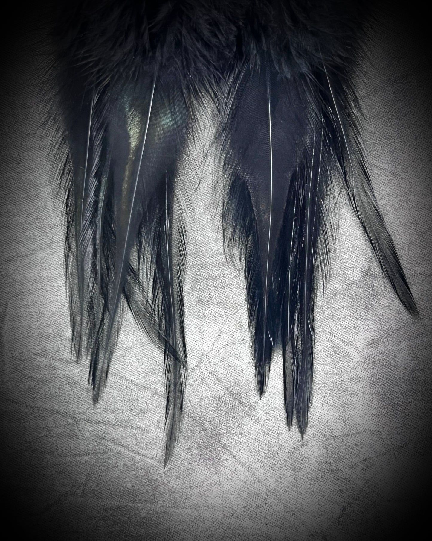 Stunning handmade ruby gemstone and black feather dangle earrings for her. Rule like a queen in these maximalist boho earrings for vacations, festivals or a bold bride!