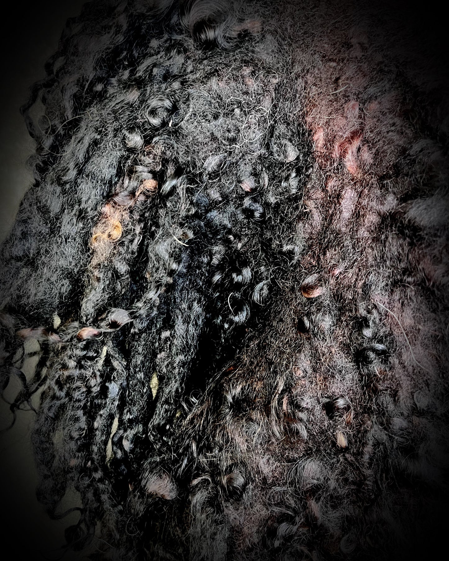 Close-up of black sculptural wool collar — witchy gothic fantasy costume piece.