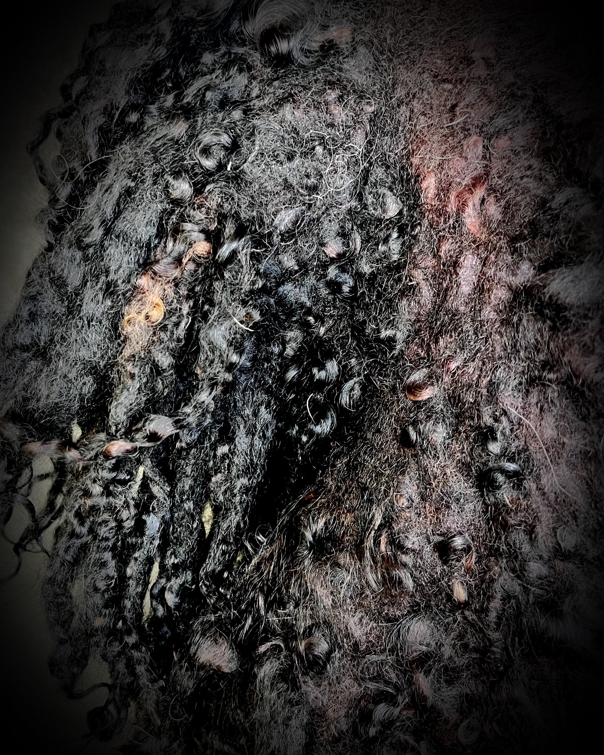 Close-up of black sculptural wool collar — witchy gothic fantasy costume piece.