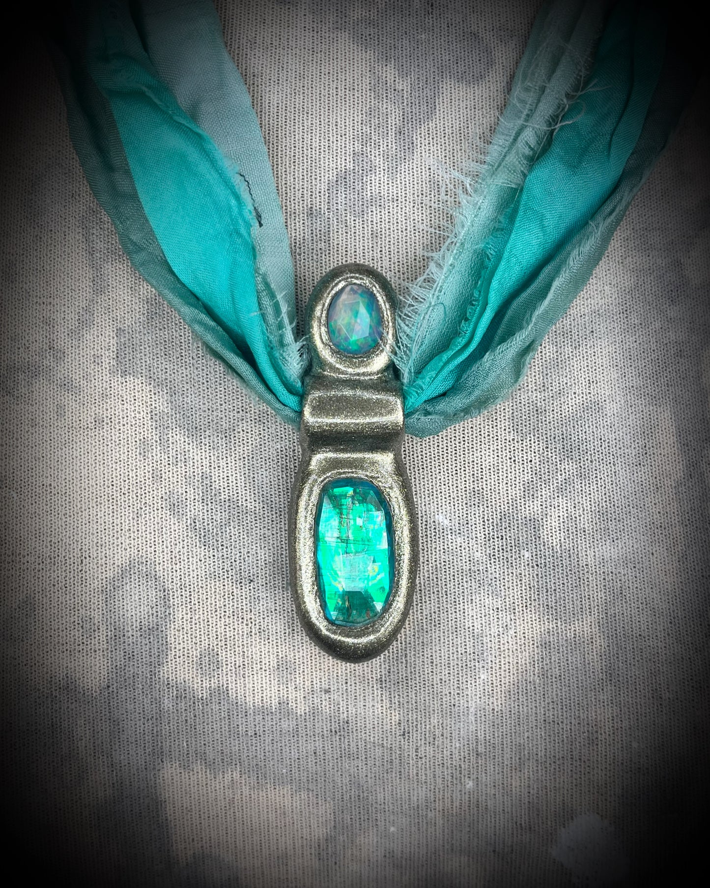 Green kyanite and opal gemstone faceted crystal healing heart chakra pendant on recycled silk. Best travel jewelry for summer, festival or wedding