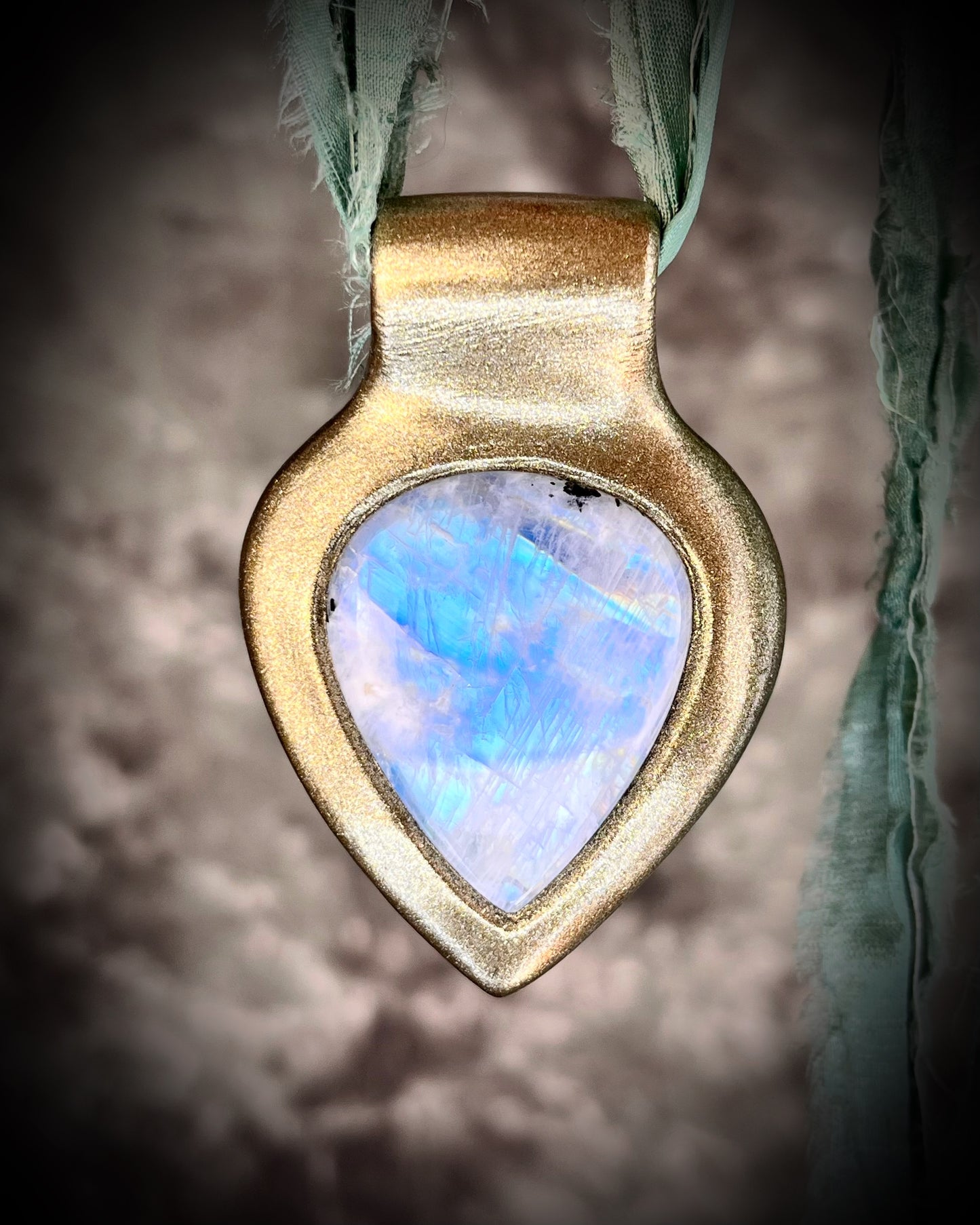 Dreamy handmade rainbow moonstone sculptural necklace in gold, hung from aqua recycled silk for an ethereal boho elegance. Perfect for summer travel, mothers day gifting, bridal shower gift or everyday magic!