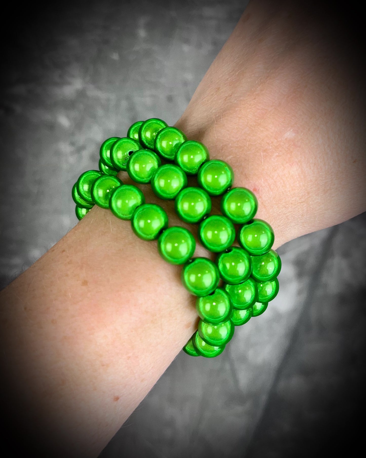 Colorful Eclipse bracelets from Become Spellbound! Magical illusion bracelets for stacking, parties, summer jewelry, festivals, raves, travel jewelry and more! Gift for her, shamrock green beaded bracelet.
