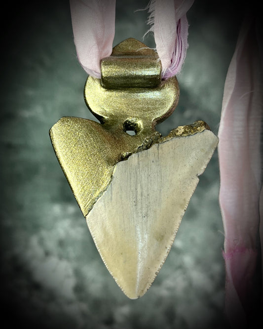 Megalodon fossil tooth necklace featuring a pink plume agate crystal for a romantic Valentine’s Day gift for a queen! This special handmade talisman is hung from pink recycled silks for a mystical and empowering gift for her.