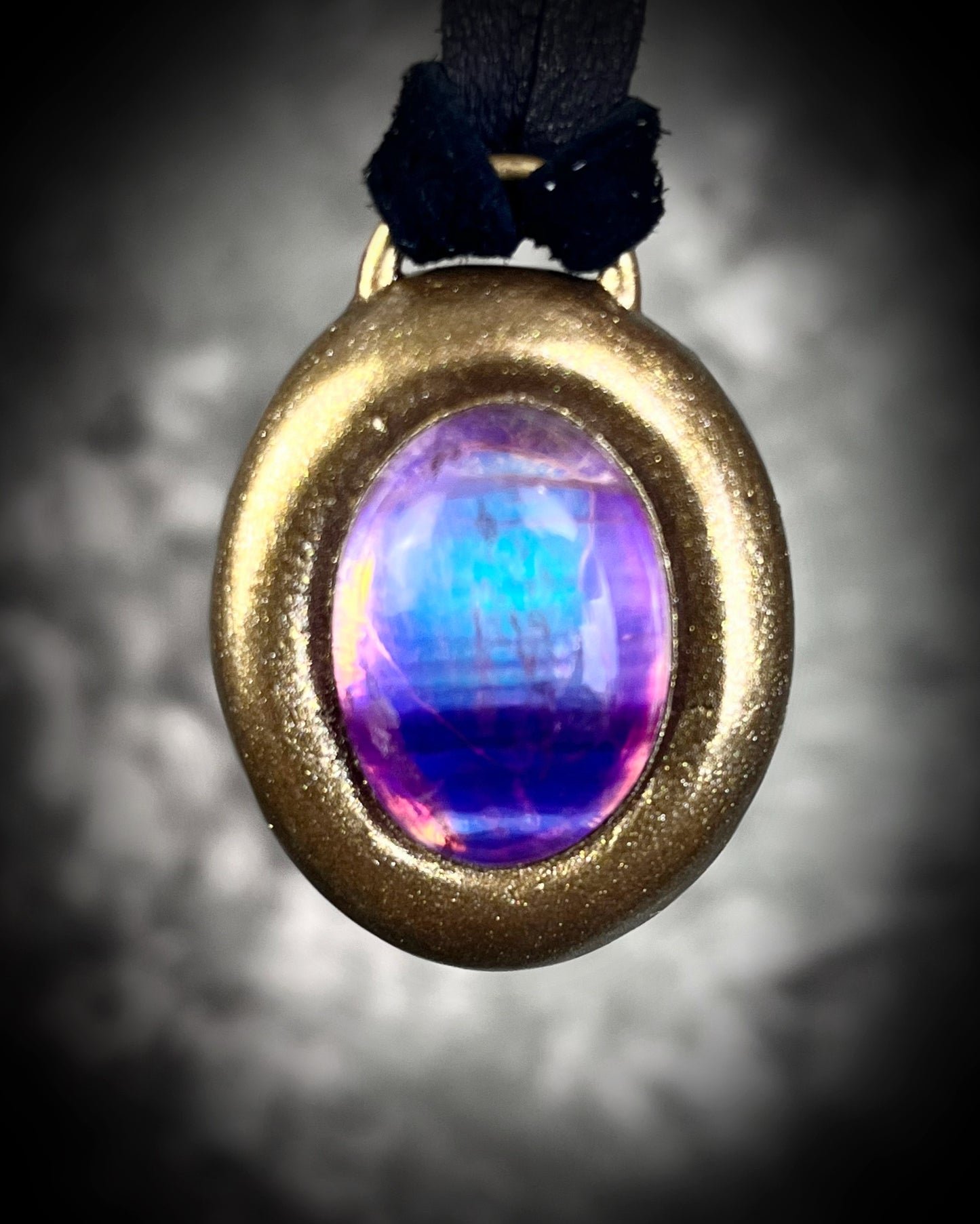 Fluorite cabochon oval necklaces in gold tone settings on black leather – mystical crystal jewelry for clarity, focus, and balance. Handmade gemstone pendant talismans, grounding and protective fluorite statement necklaces, perfect spiritual jewelry for daily wear, meditation, or gifting.