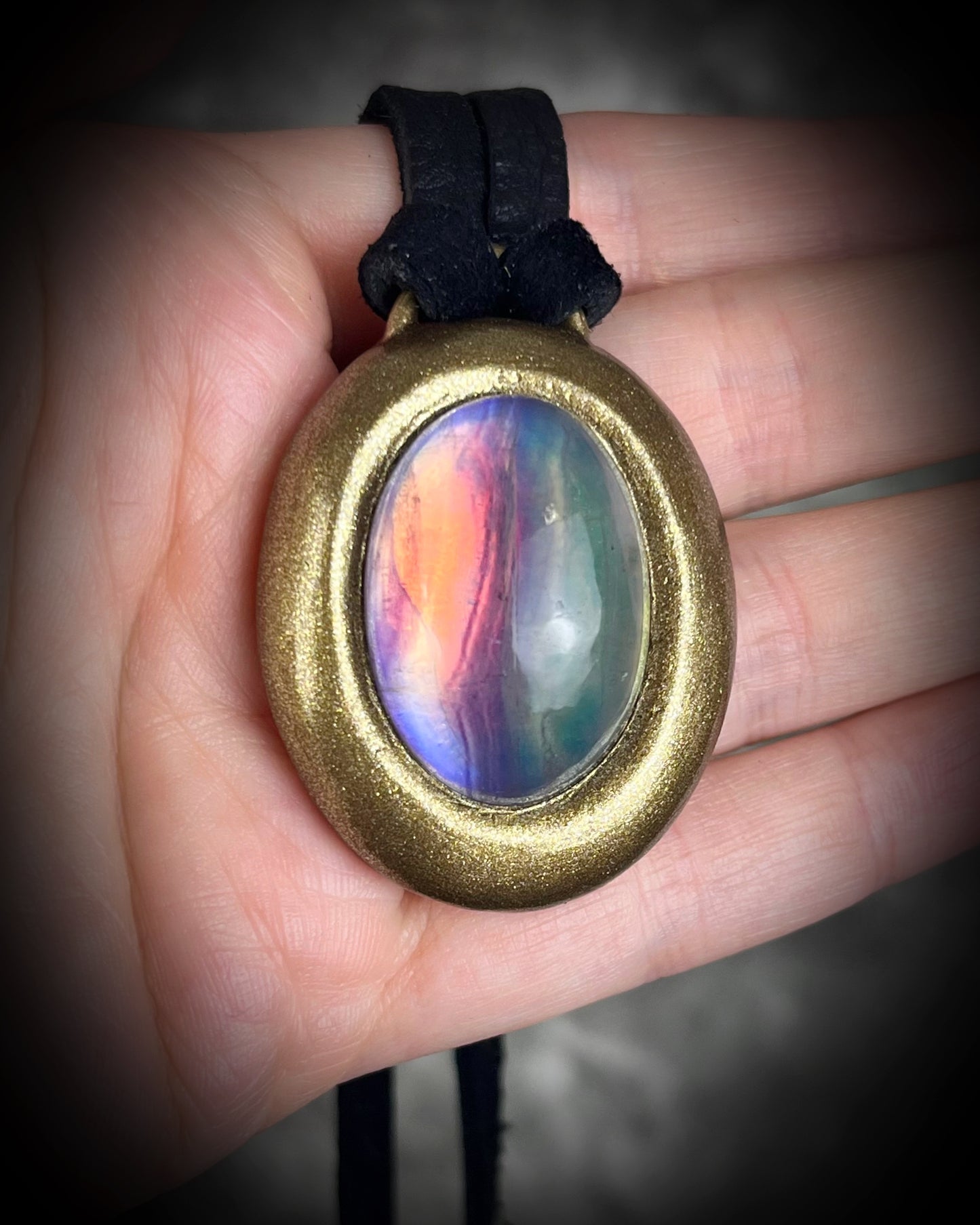 Fluorite cabochon oval necklaces in gold tone settings on black leather – mystical crystal jewelry for clarity, focus, and balance. Handmade gemstone pendant talismans, grounding and protective fluorite statement necklaces, perfect spiritual jewelry for daily wear, meditation, or gifting.