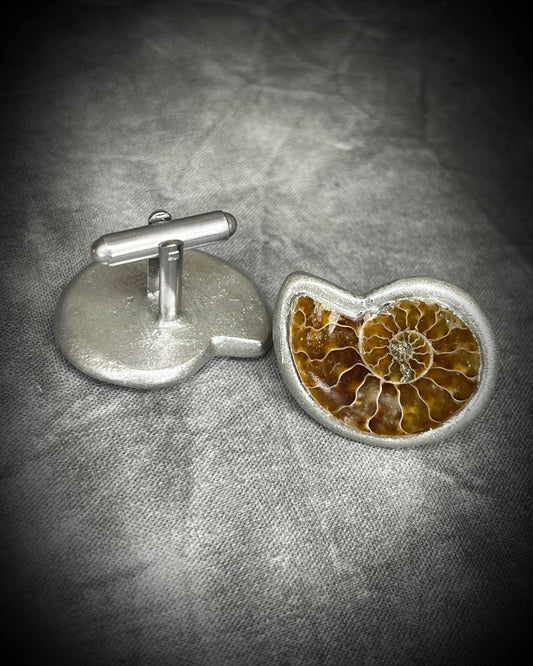 Genuine ammonite fossil cufflinks with silver finish and stainless steel cufflink bases, featuring natural spiral fossils. One-of-a-kind mens accessories by Become Spellbound.