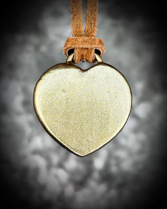 Green Aventurine crystal heart necklace on brown leather. Jewelry for luck, abundance, valentine's day and everyday magic!