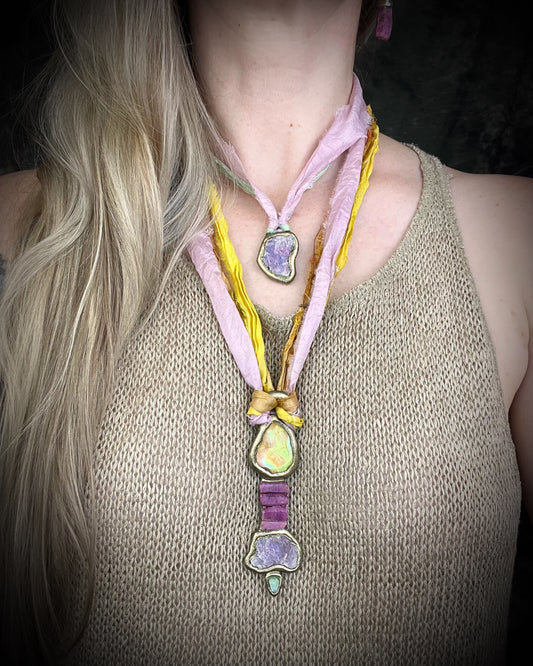 Handcrafted Libyan Desert Glass, Ruby, Lepidolite and Green Tourmaline Museum grade talisman pendant hung from recycled silks in a gold sculptural finish.