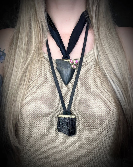 Handmade genuine fossil Megalodon Talisman necklace with bright pink Rubellite Tourmaline gemstones. Hung from elegant black Silk for summer adventures and magic, the perfect gift for her. layered here with grounding black tourmaline talisman.