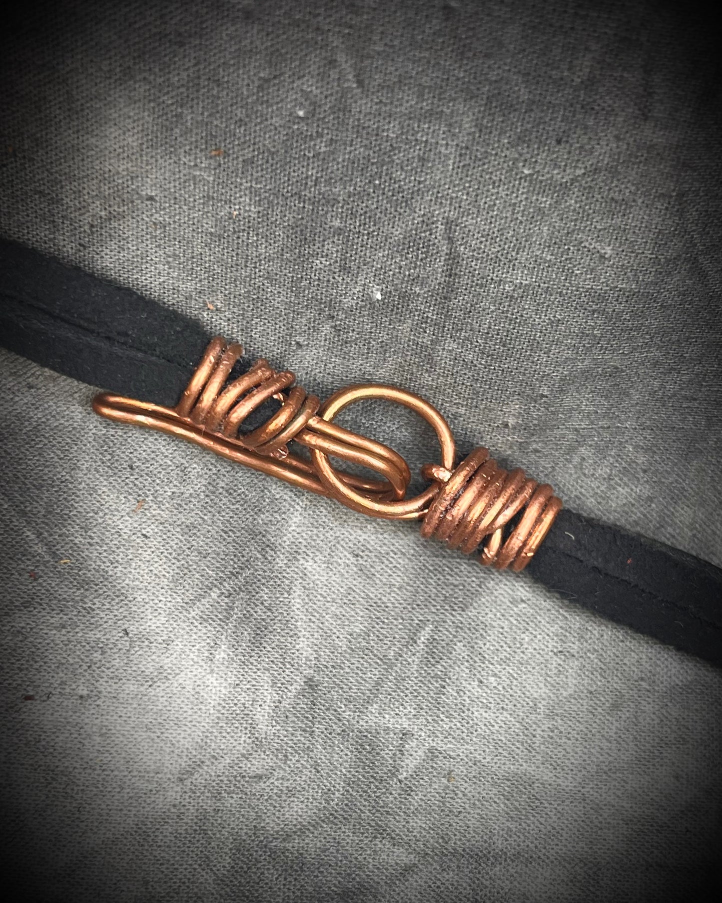 Handmade leather crystal necklace with XL amethyst point, honey jade, green chrysocolla, and handmade wire clasp by Anothai Hansen.