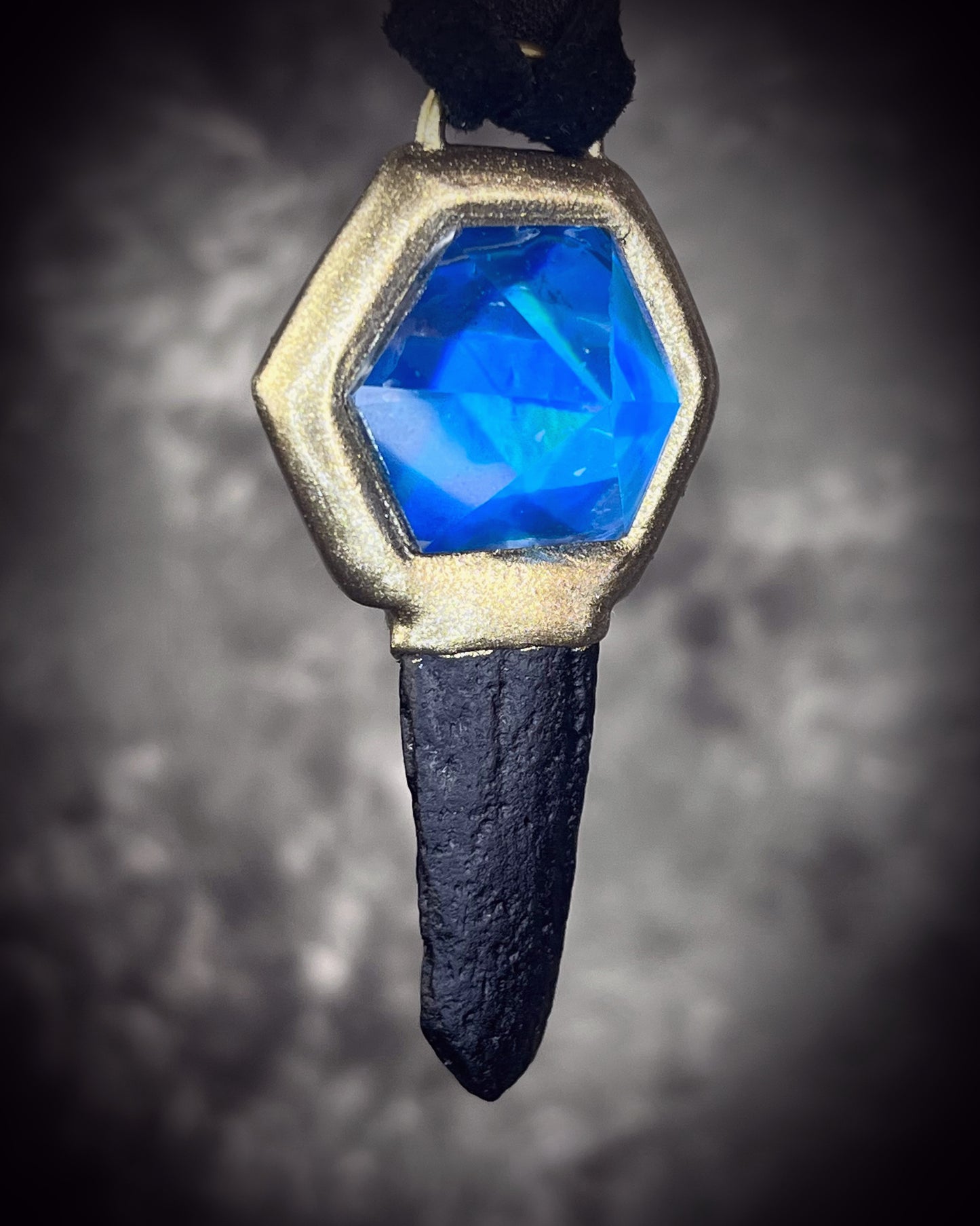 Indochinite tektite and quartz crystal talisman on leather, handmade in Baltimore, Maryland by Become Spellbound.