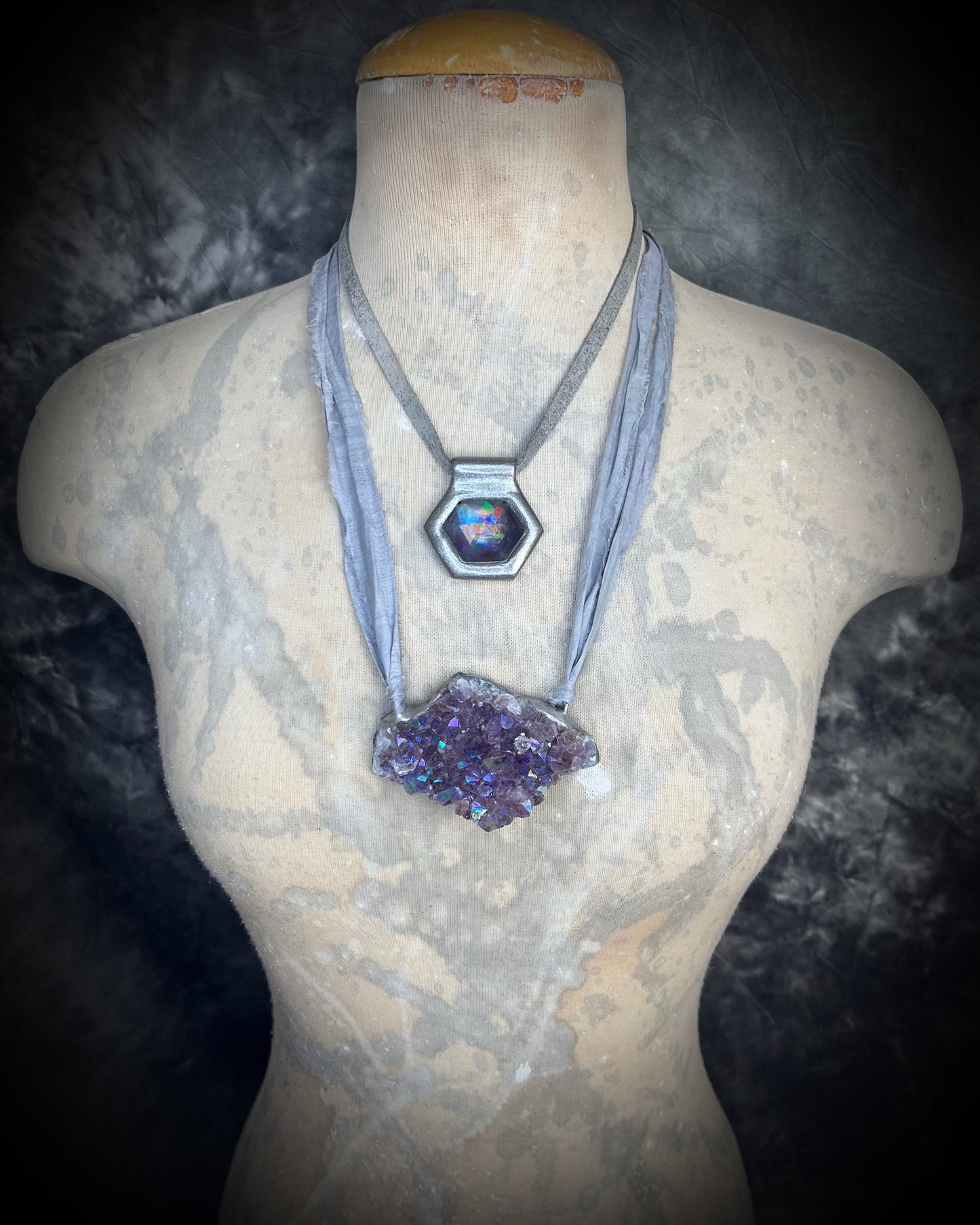Iridescent aura black rainbow quartz crystal pendant in silver hanging from grey leather, chunky gemstone jewelry gift for her. David Bowie inspired jewelry.