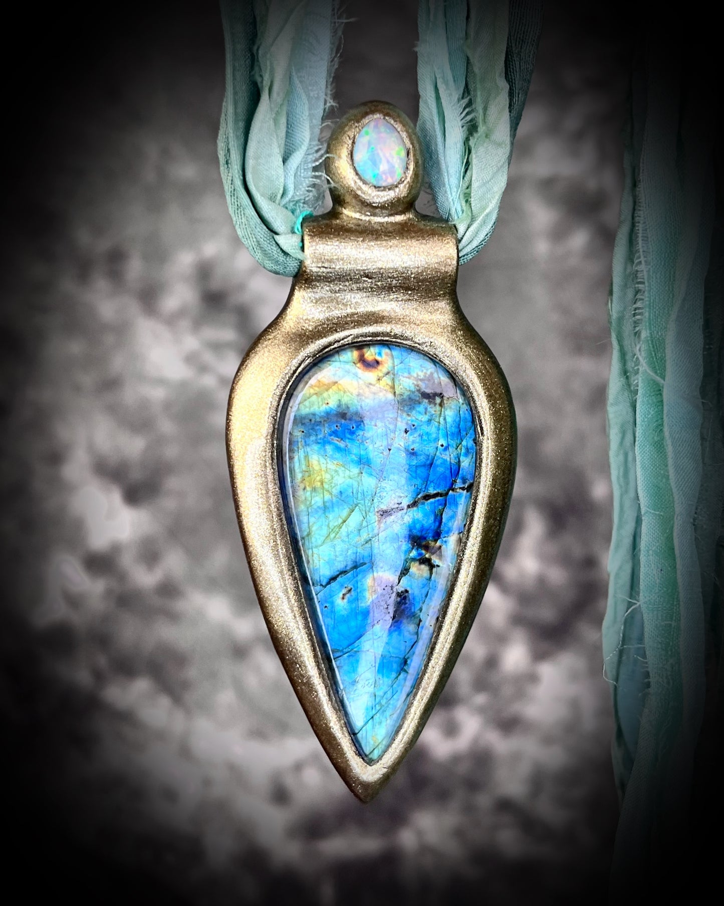Labradorite and opal gemstone handmade crystal healing talisman on aqua recycled silks. Boho summer festival jewelry for the modern goddess.