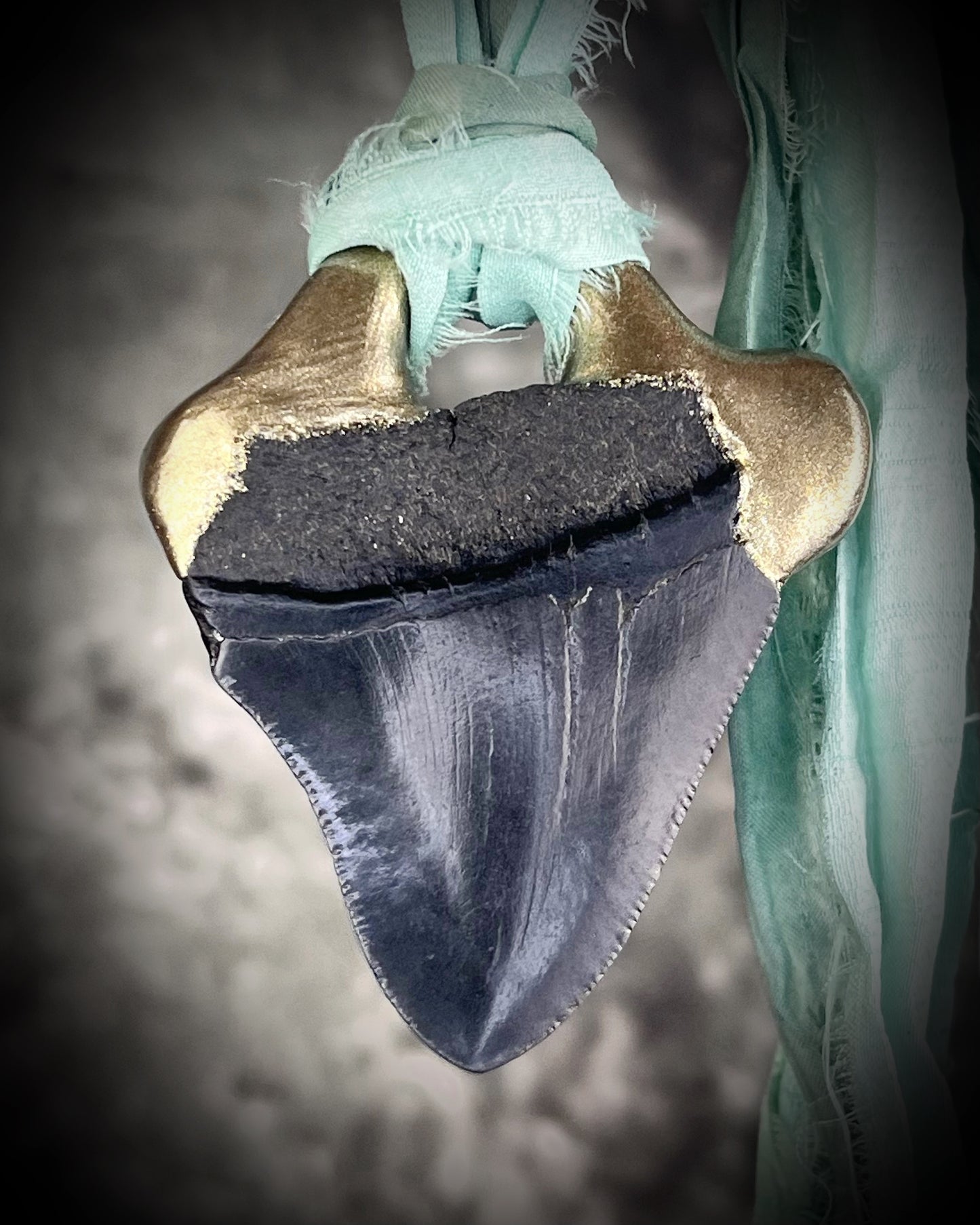 Megalodon shark tooth fossil handcrafted crystal talisman featuring opal gemstone and rainbow moonstones in gold, hung from recycled aqua silk. Beach wedding or summer jewelry photoshoot, cosplay, fantasy film costume or everyday enchantment!