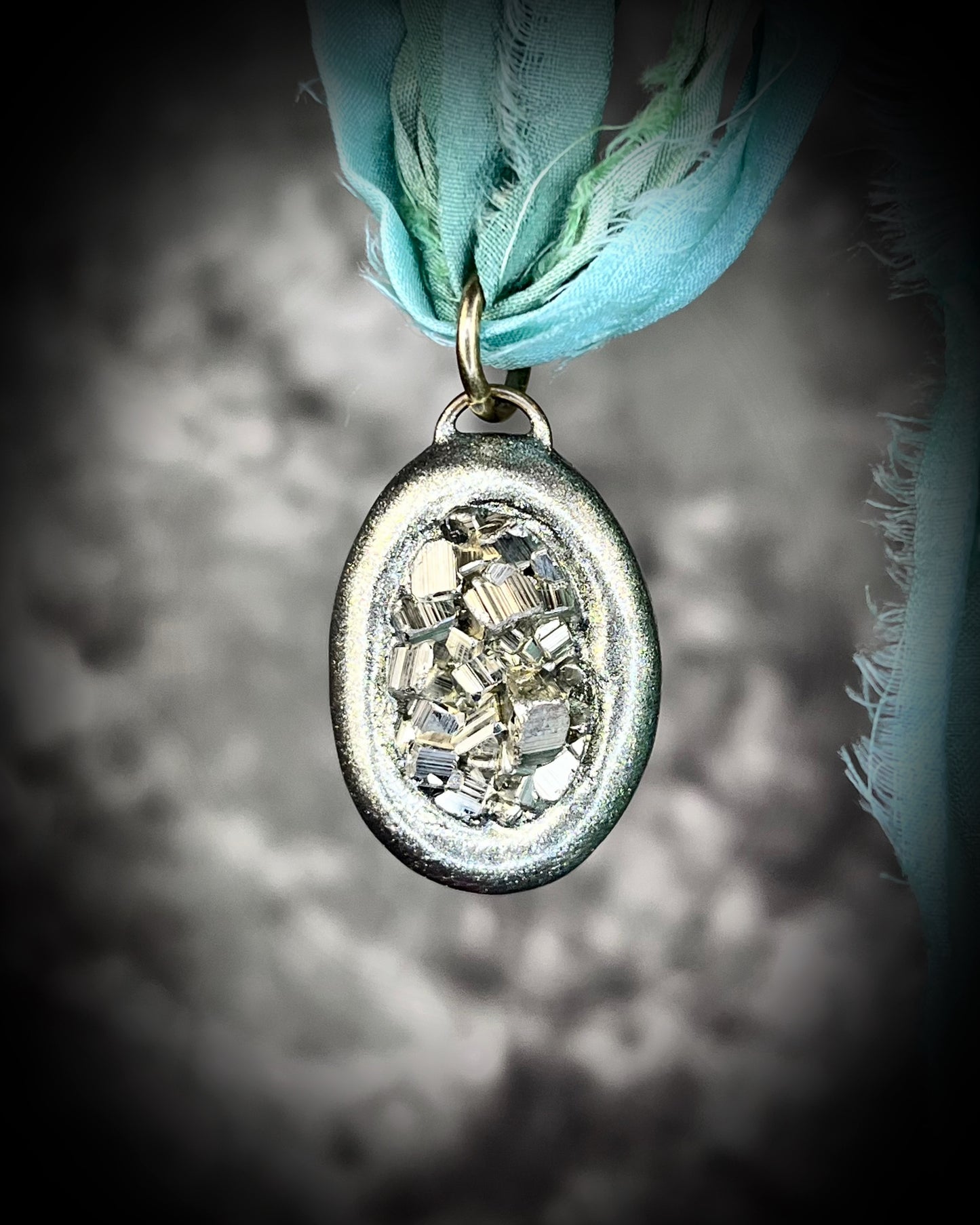 Pyrite crystal handmade necklace on aqua recycled silk for boho summer adventures and manifesting magic, perfect summer jewelry for boho beach adventures and yoga retreats.