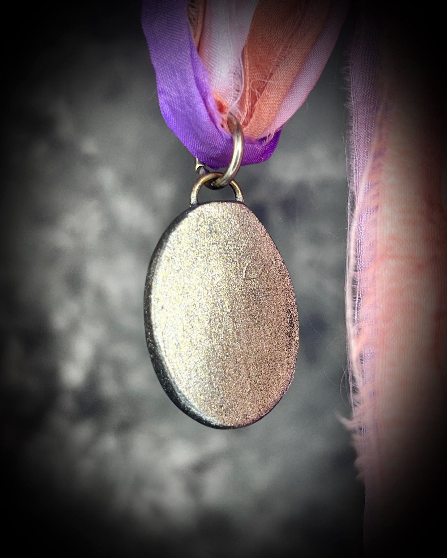 Pyrite crystal handmade necklaces on pink and purple recycled silk for boho summer adventures and manifesting magic! Car protection charm or purse charm. Best sustainable festival jewelry for summer adventures and eco-friendly parties