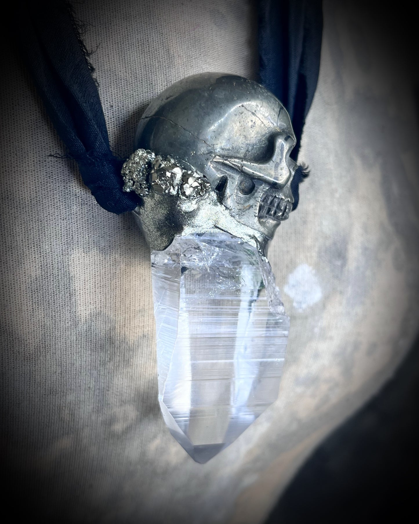 Pyrite skull pendant necklace with raw quartz crystal on black recycled silk, gothic crystal jewelry, handmade mystical talisman.