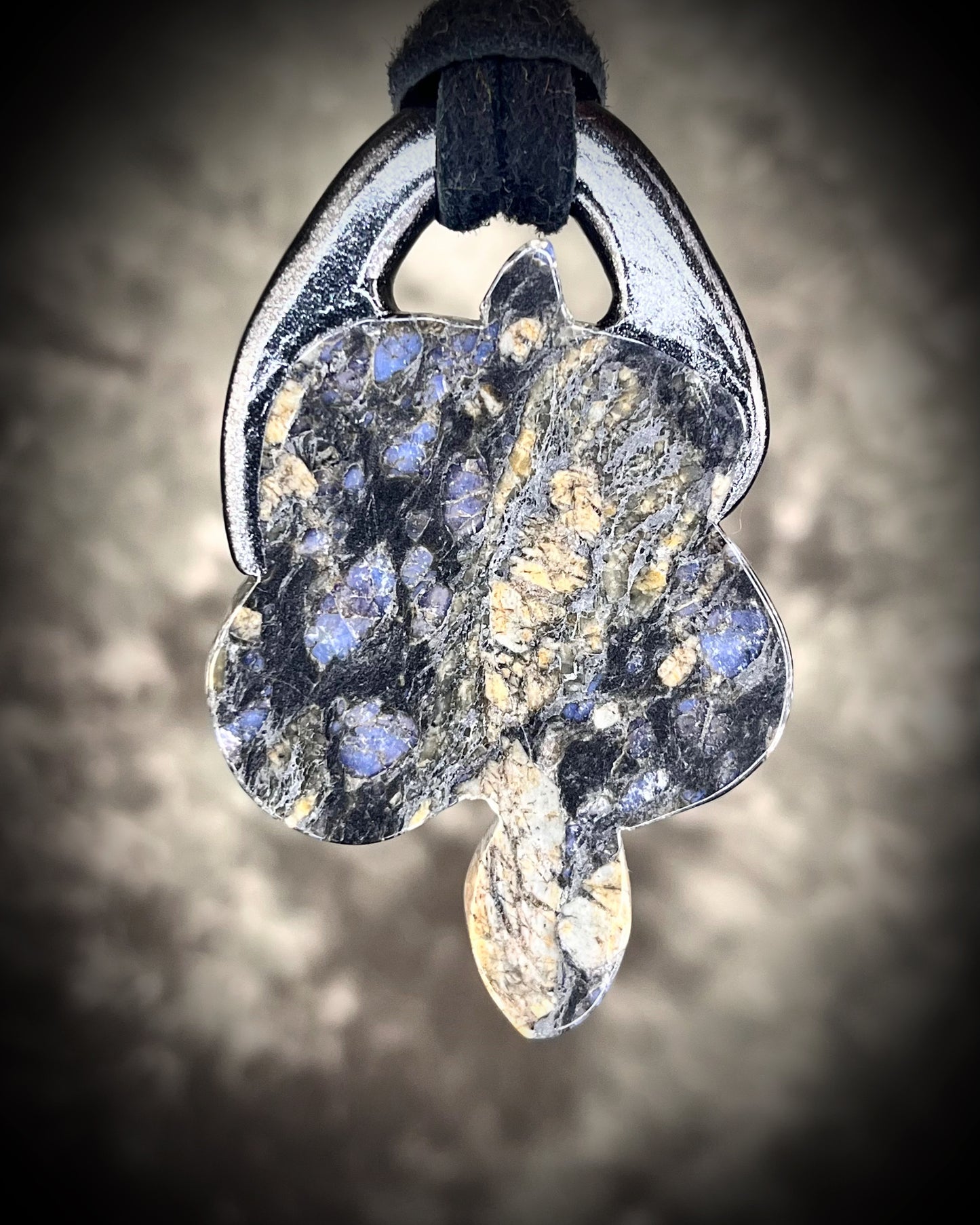 Que Sera crystal carved snake or serpent necklace for 2025 year of the snake. Handmade and hung from black leather for a mystical goddess.