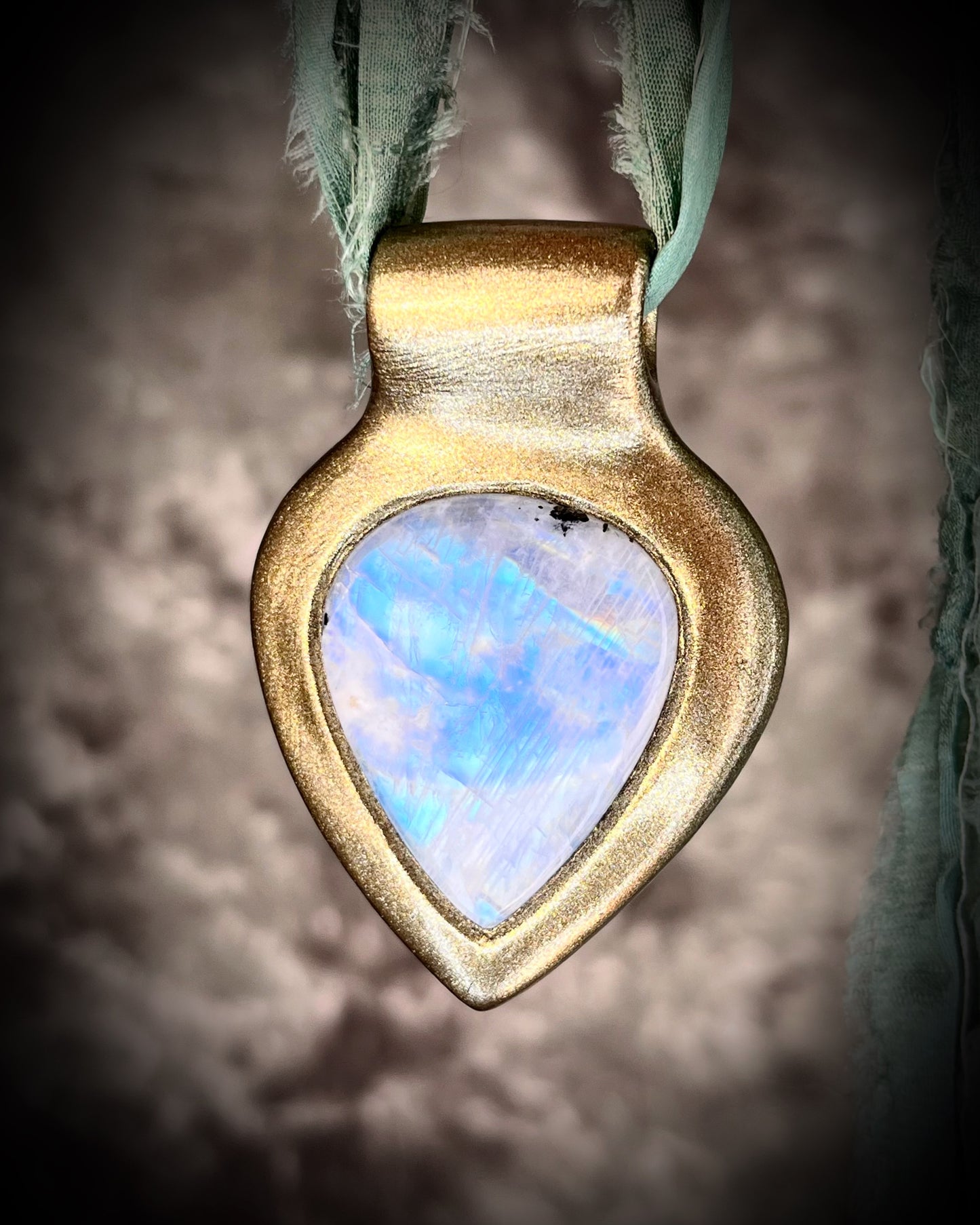 Dreamy handmade rainbow moonstone sculptural necklace in gold, hung from aqua recycled silk for an ethereal boho elegance. Perfect for summer travel, mothers day gifting, bridal shower gift or everyday magic!