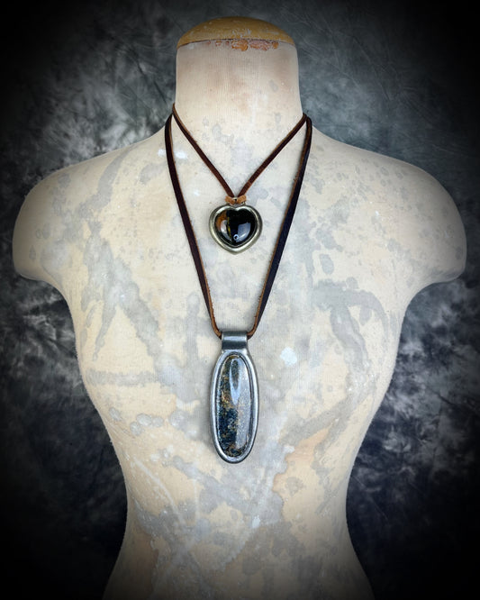 Shimmering moss kyanite crystal healing talisman in dark silver finish hung from soft and rugged brown leather. Gift intuition, transformation and communication.