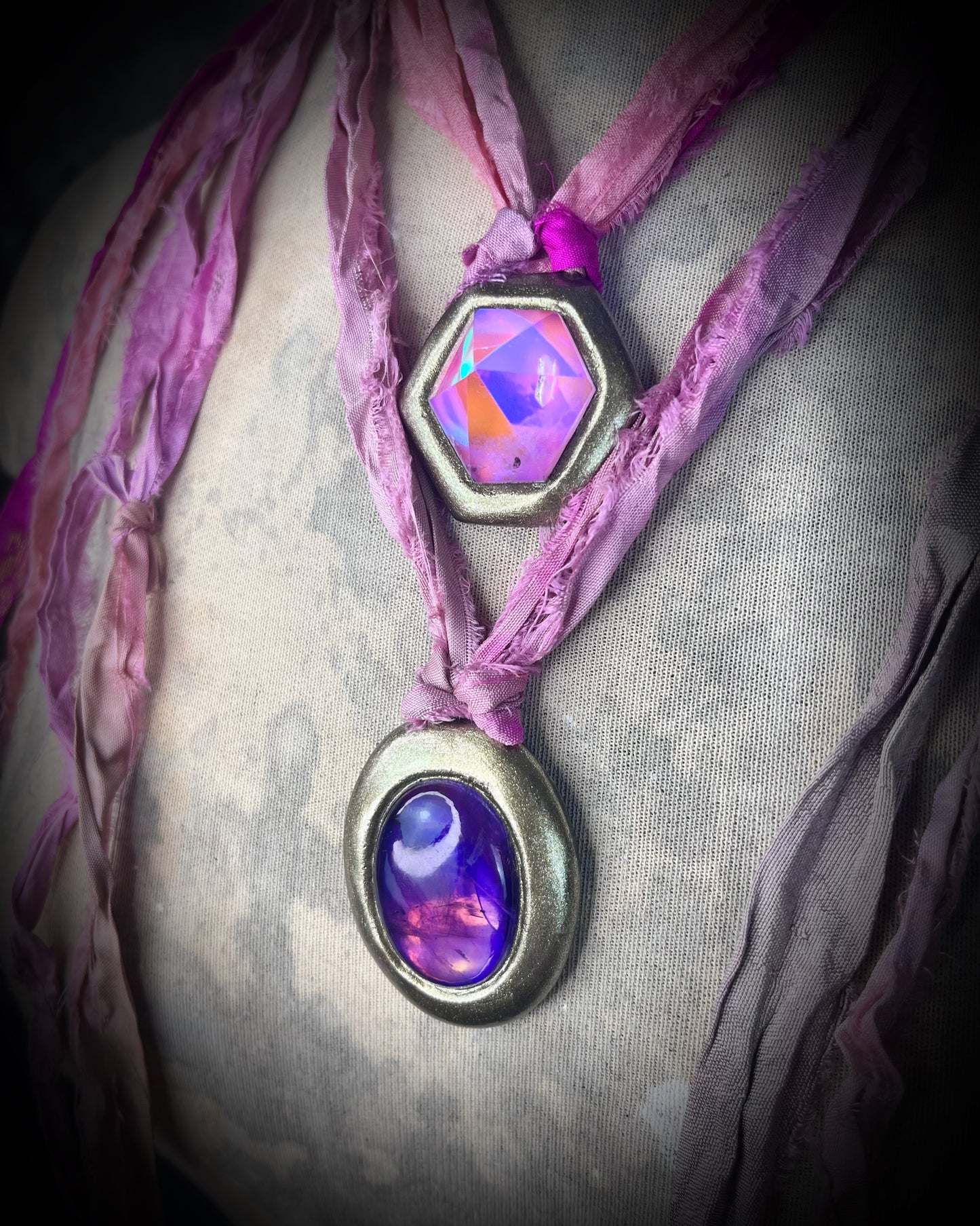 Opalescent unocorn vibes handmade pink quartz crystal necklace in a gold finish with magenta recycled silk for an eco-friendly and whimsical summer festival or vacation jewelry appeal.