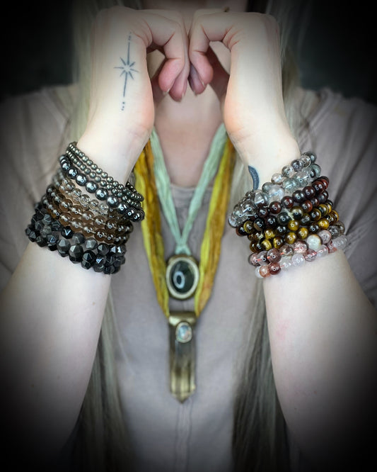 Raw stone, natural crystal healing beaded bracelets for protection, grounding, emf shielding and gemstone magic! Crystal stacking bracelets for modern maximalism and dopamine dressing!