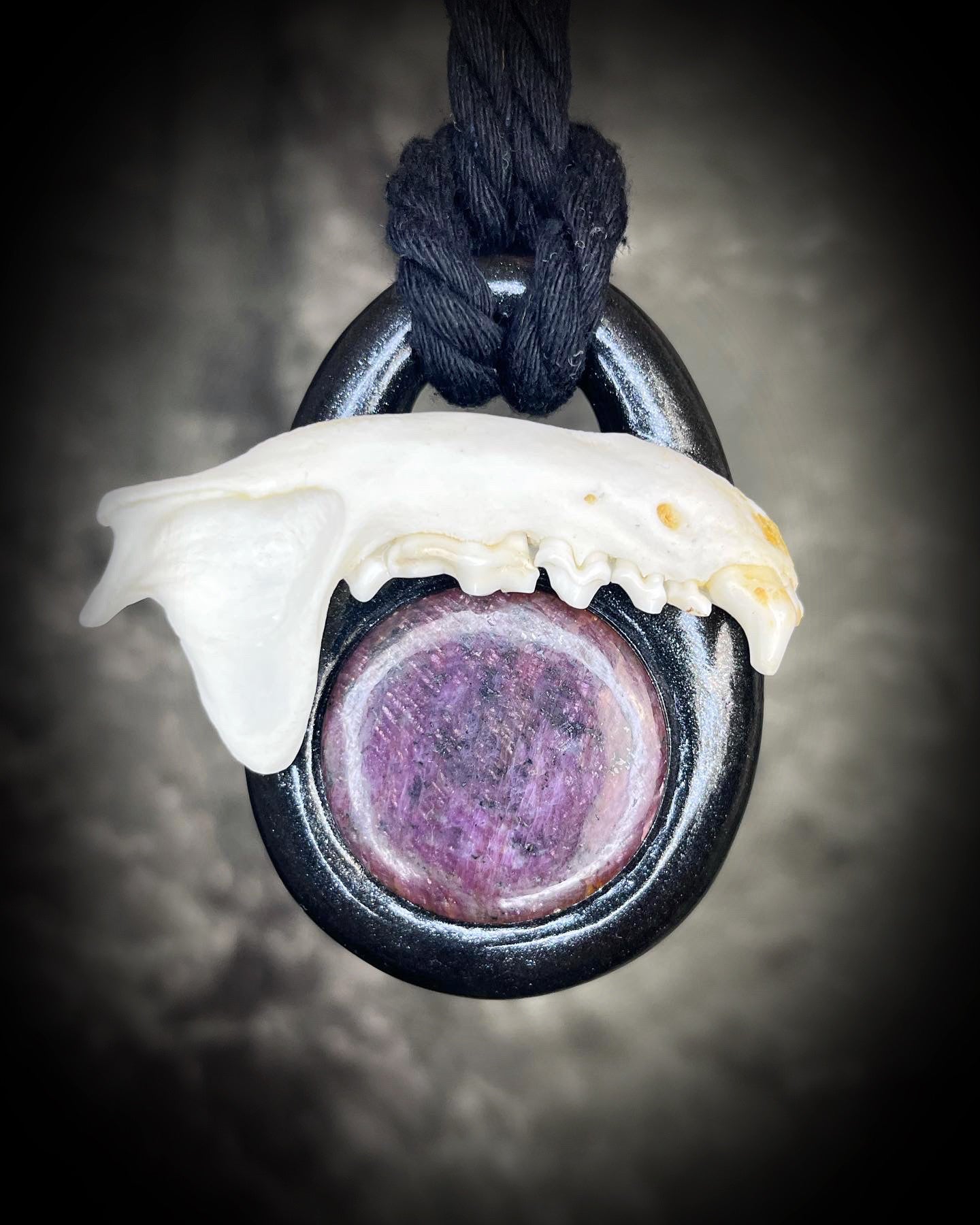 Ruby with Otter Jaw Bone Talisman