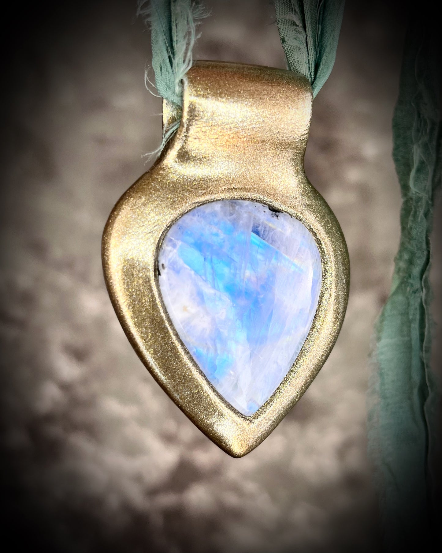 Dreamy handmade rainbow moonstone sculptural necklace in gold, hung from aqua recycled silk for an ethereal boho elegance. Perfect for summer travel, mothers day gifting, bridal shower gift or everyday magic!