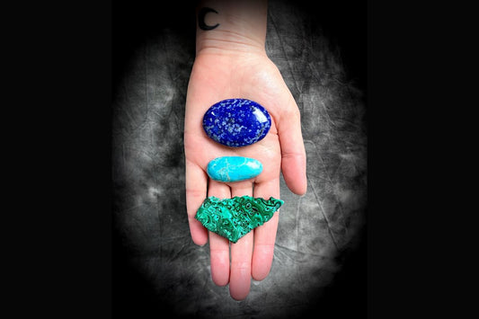 Natural Gemstone Jewelry Guide Featuring Lapis Lazuli, Turquoise and Malachite Crystal Healing Chakra Jewelry- Shown here stones in a hand 