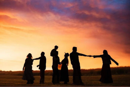 Handmade designer gold jewelry is being modeled by woman wearing white holiday attire and bearing gifts of antlers and a giant quartz crystal! 