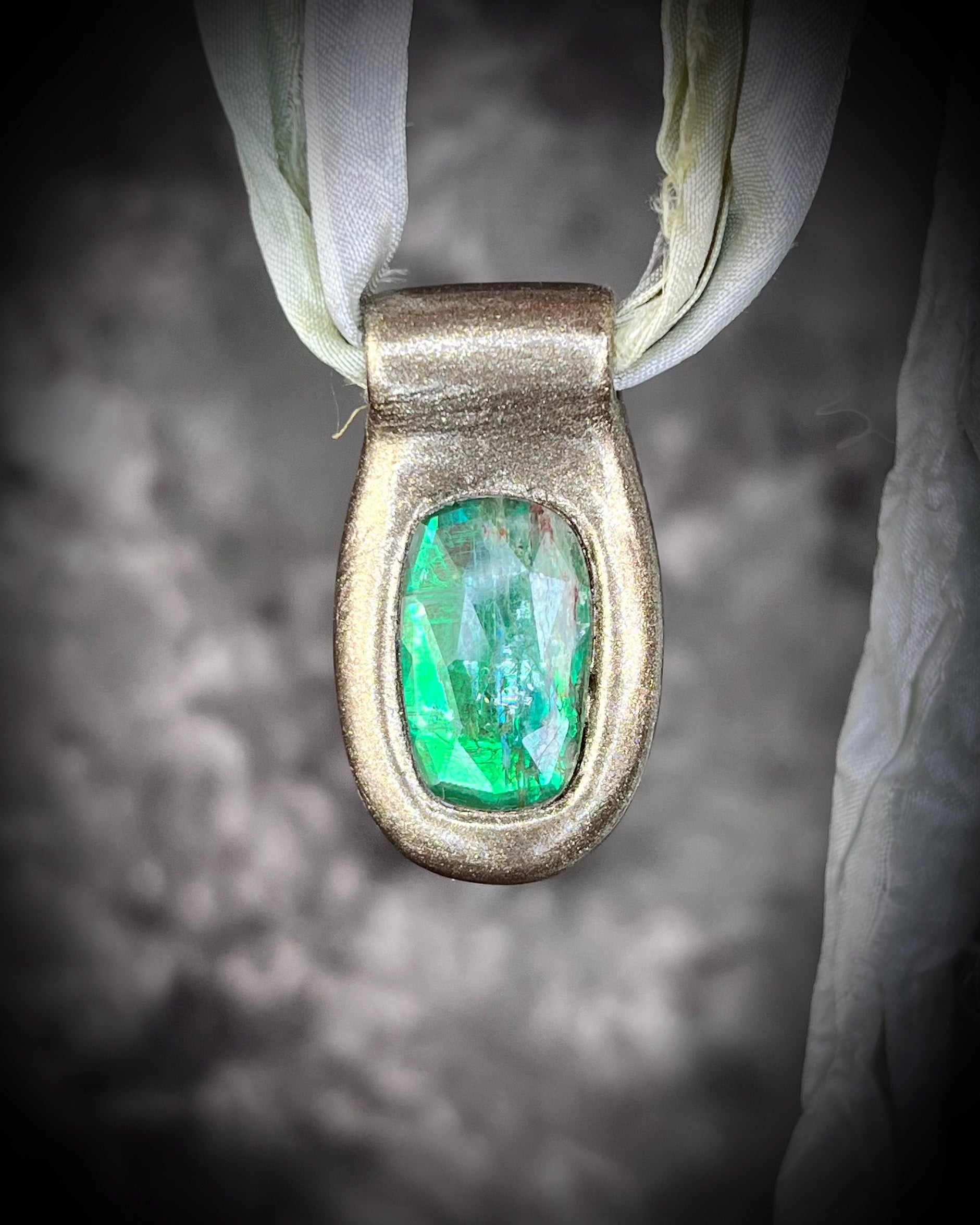 Green kyanite gemstone faceted crystal healing heart chakra pendant on recycled silk.  Best travel jewelry for summer, festival or wedding!