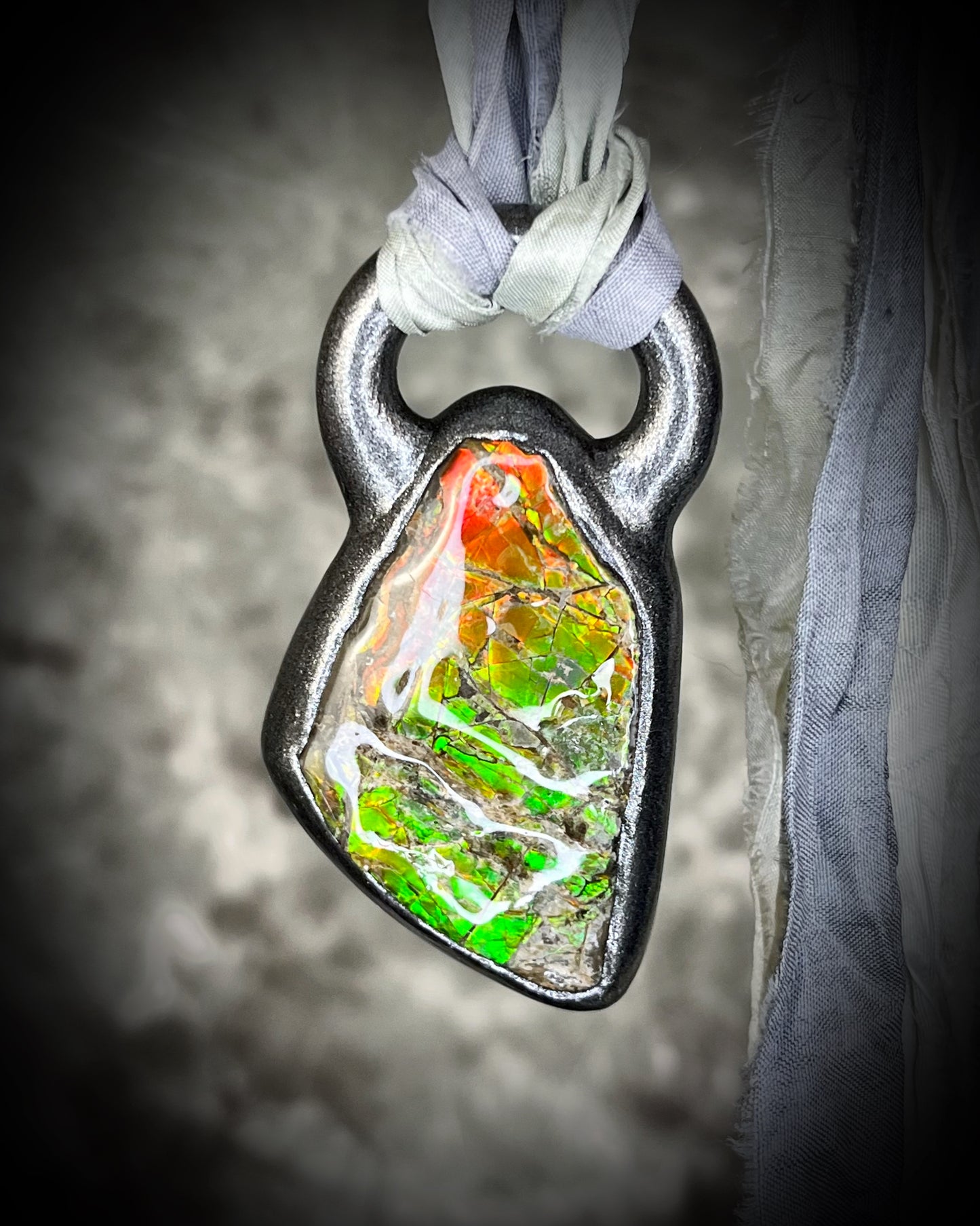 Ammolite pendant on silver recycled silks in a gunmetal silver finish.  Handmade ammolite jewelry gift for her.  