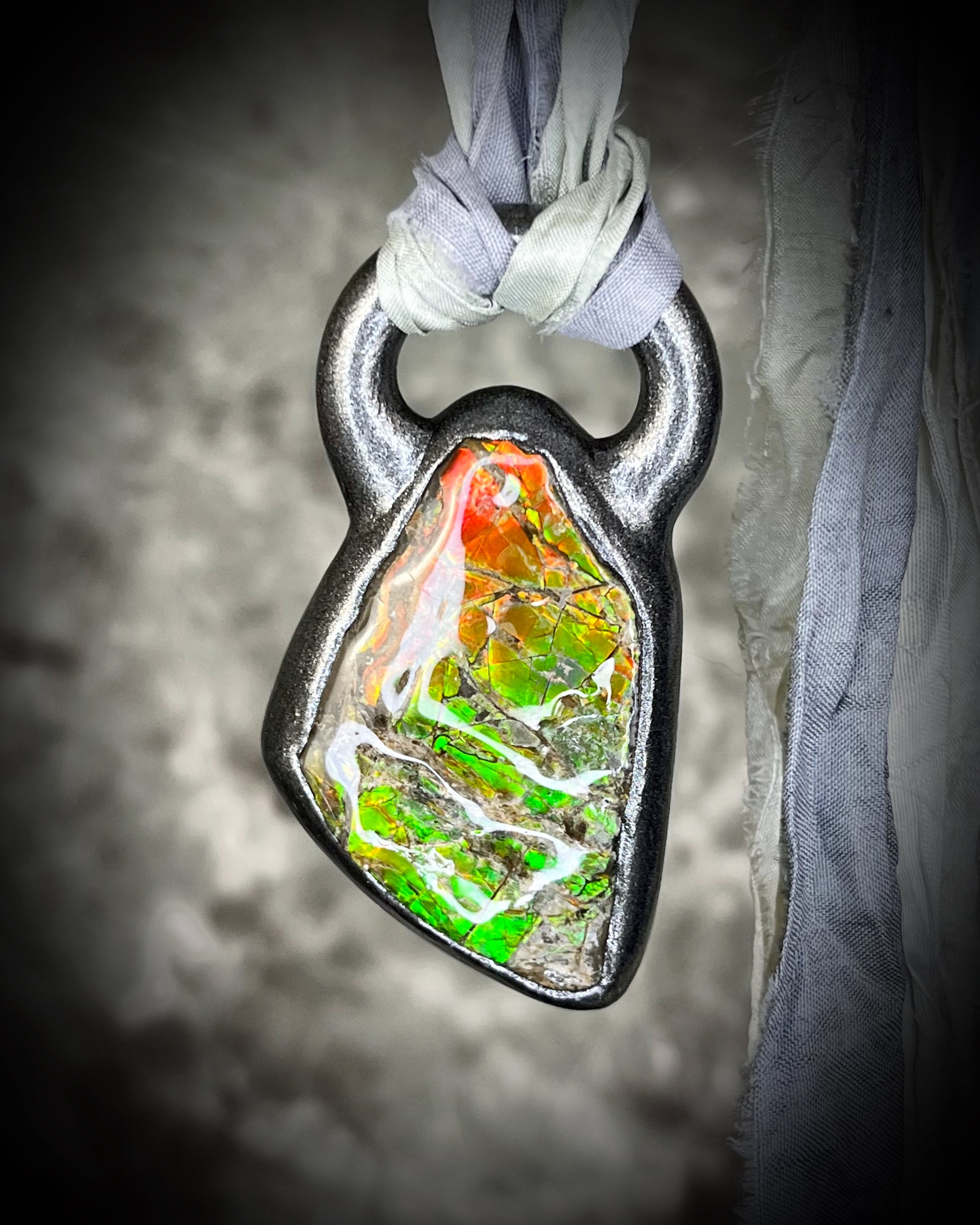 Ammolite pendant on silver recycled silks in a gunmetal silver finish.  Handmade ammolite jewelry gift for her.  