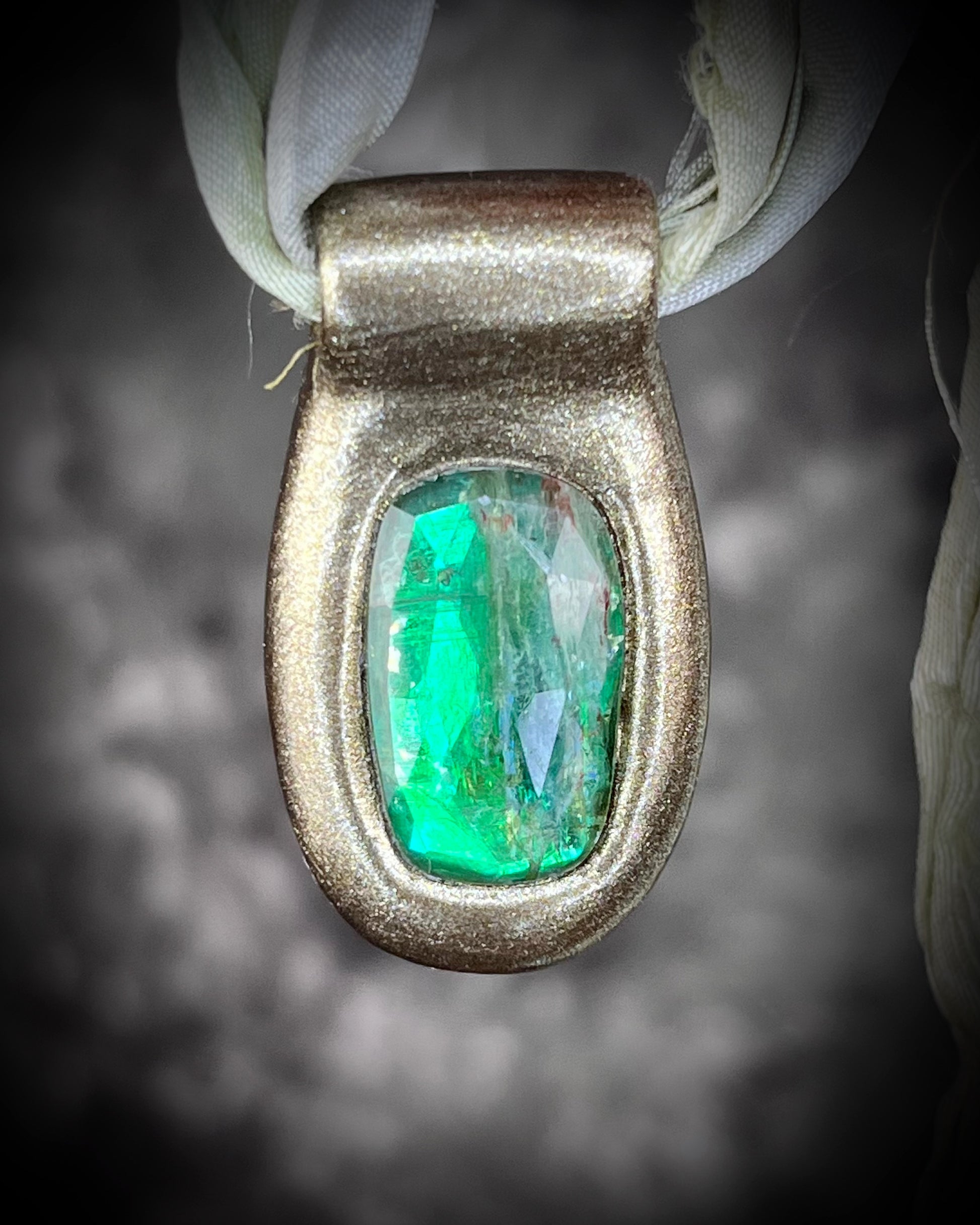 Green kyanite gemstone faceted crystal healing heart chakra pendant on recycled silk.  Best travel jewelry for summer, festival or wedding!