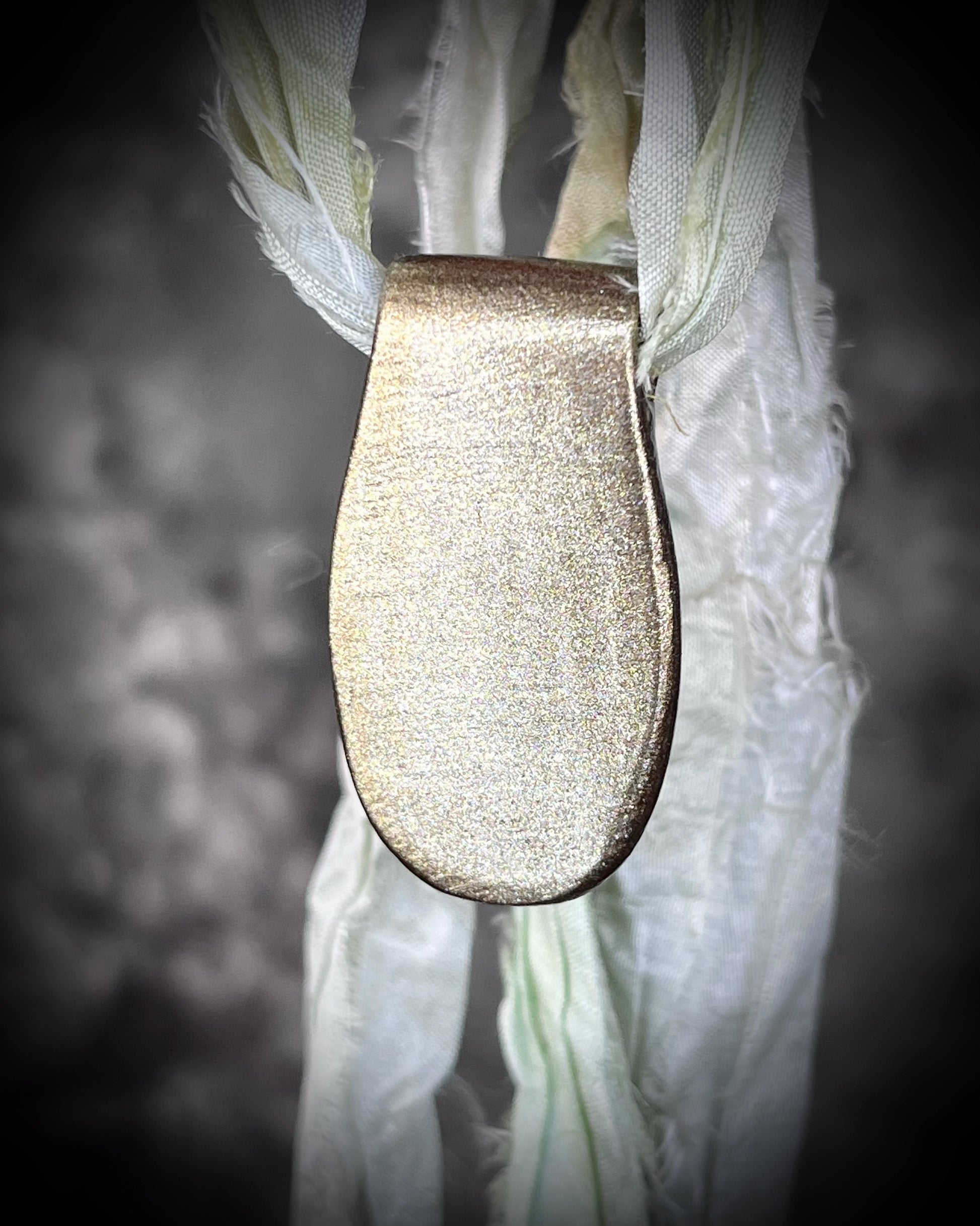 Green kyanite gemstone faceted crystal healing heart chakra pendant on recycled silk.  Best travel jewelry for summer, festival or wedding!