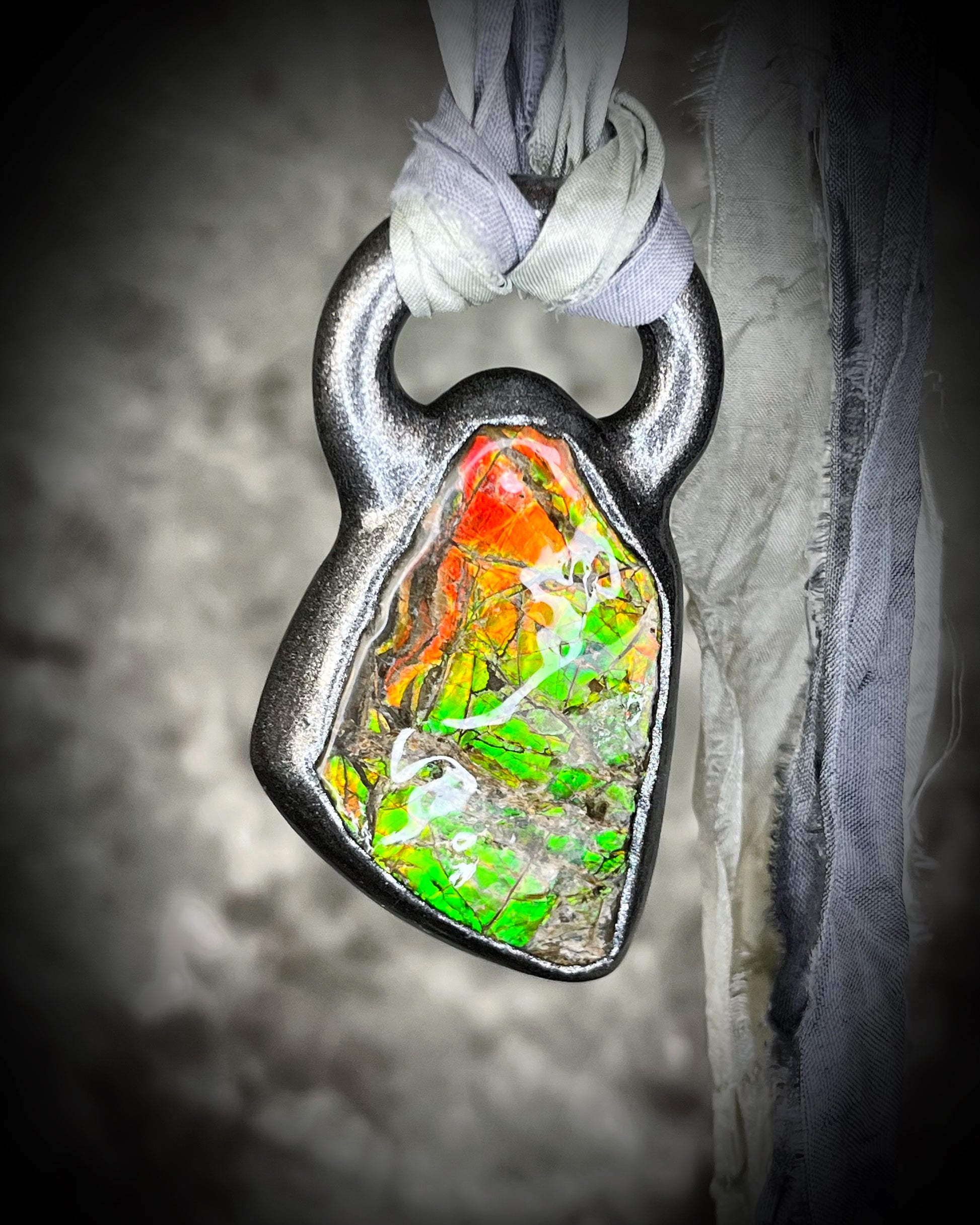 Ammolite pendant on silver recycled silks in a gunmetal silver finish.  Handmade ammolite jewelry gift for her.  