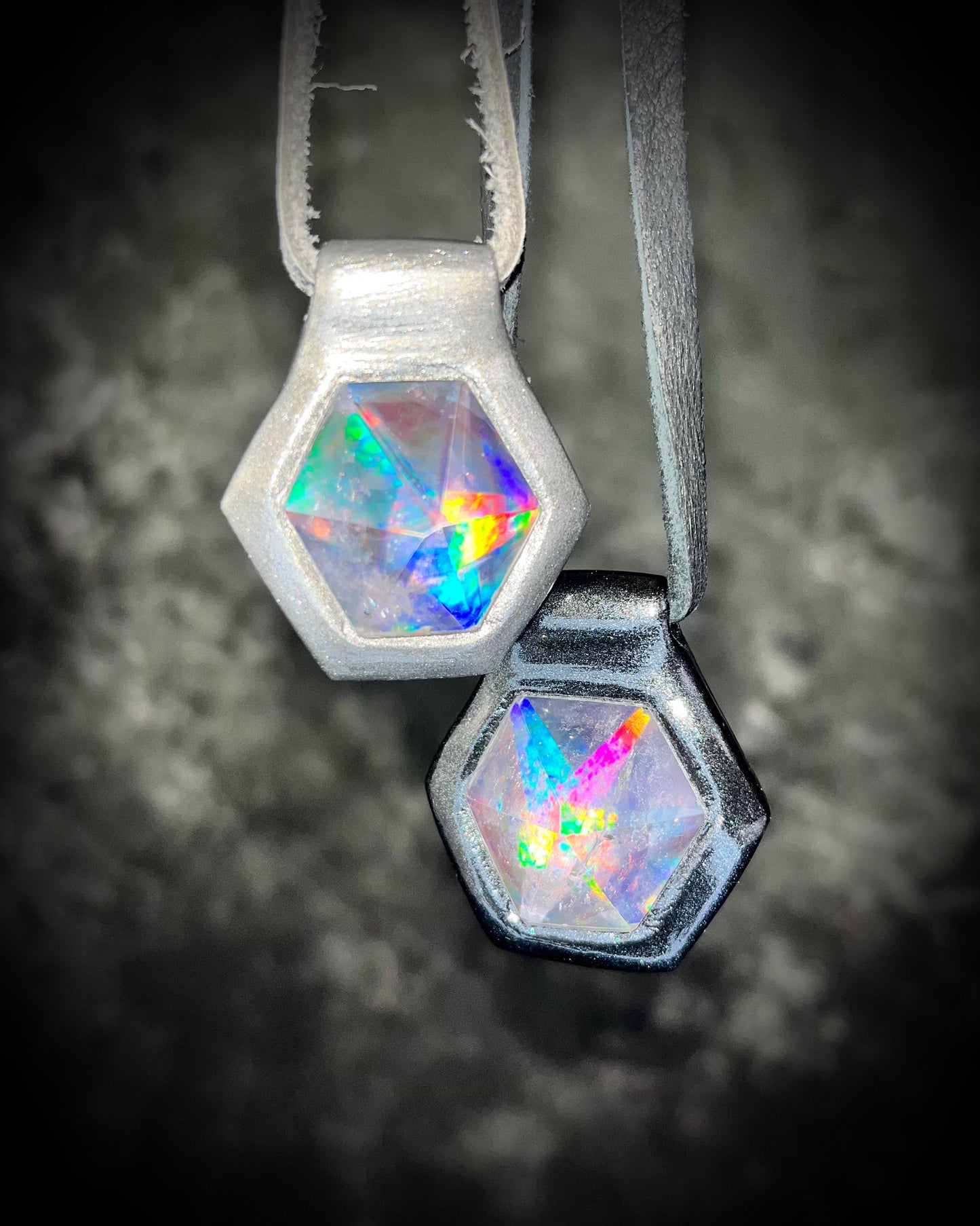 Two silver and Black David Bowie inspired designer quartz black rainbow necklaces. Hologram rainbow effect and witchy light play!
