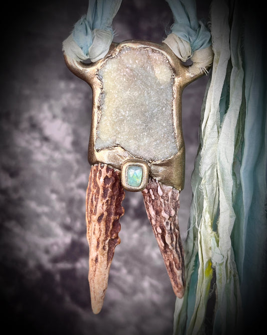 Cosplay, fantasy movie set inspired, game of thrones handmade antler and prehnite crystal talisman hung from recycled silk.  Be the Queen of Dragons with this bold and powerful necklace.  