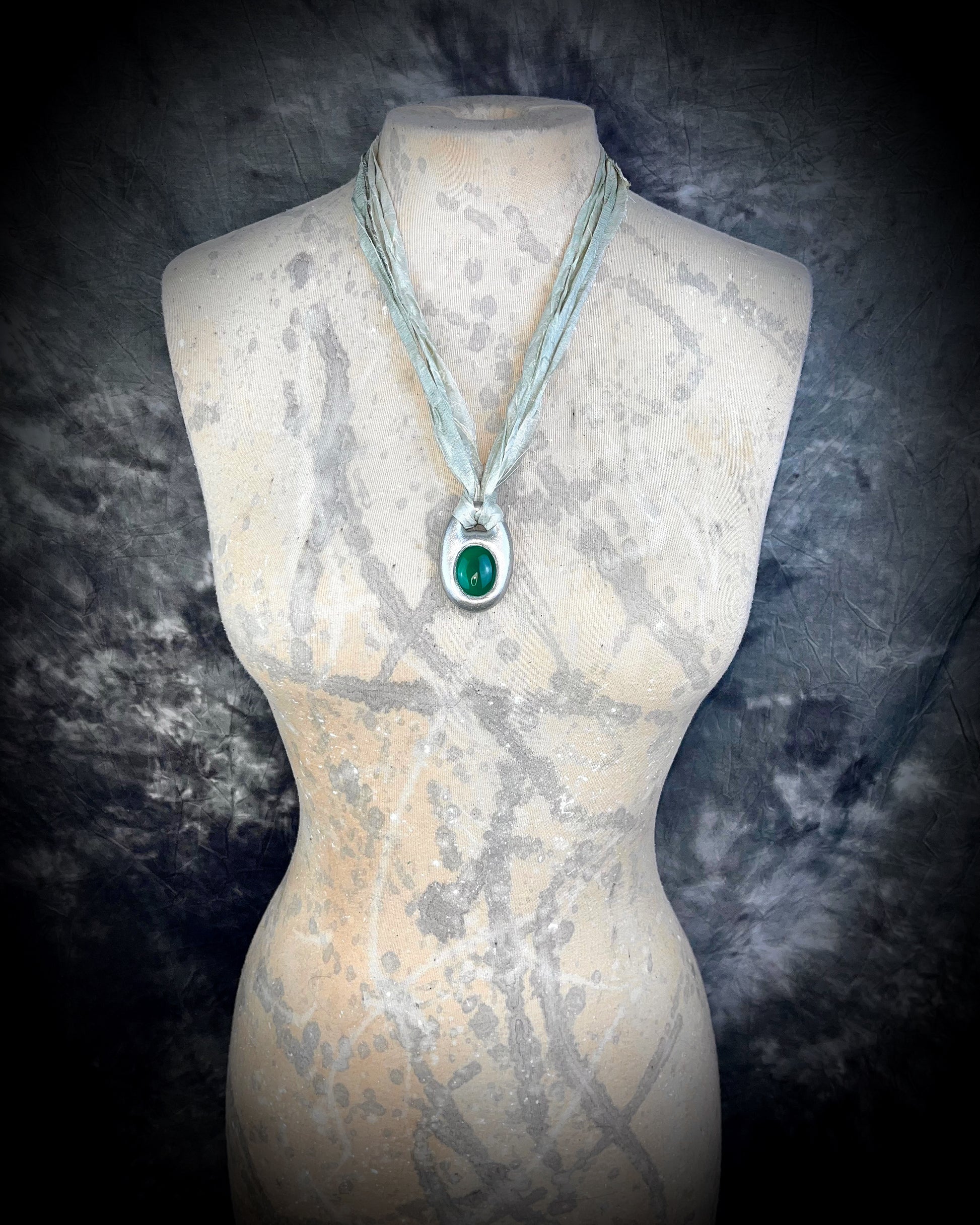 Green Onyx handmade silver necklace on recycled silk for heart chakra healing and luck.