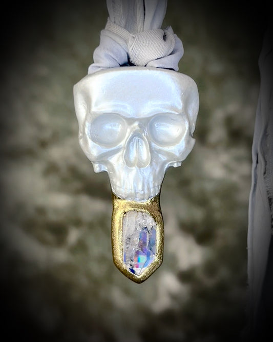 White pearl Skull-shaped pendant with a gold base and clear rainbow crystal on grey recycled silk.  White witch 2025 fall necklace gift for her. 