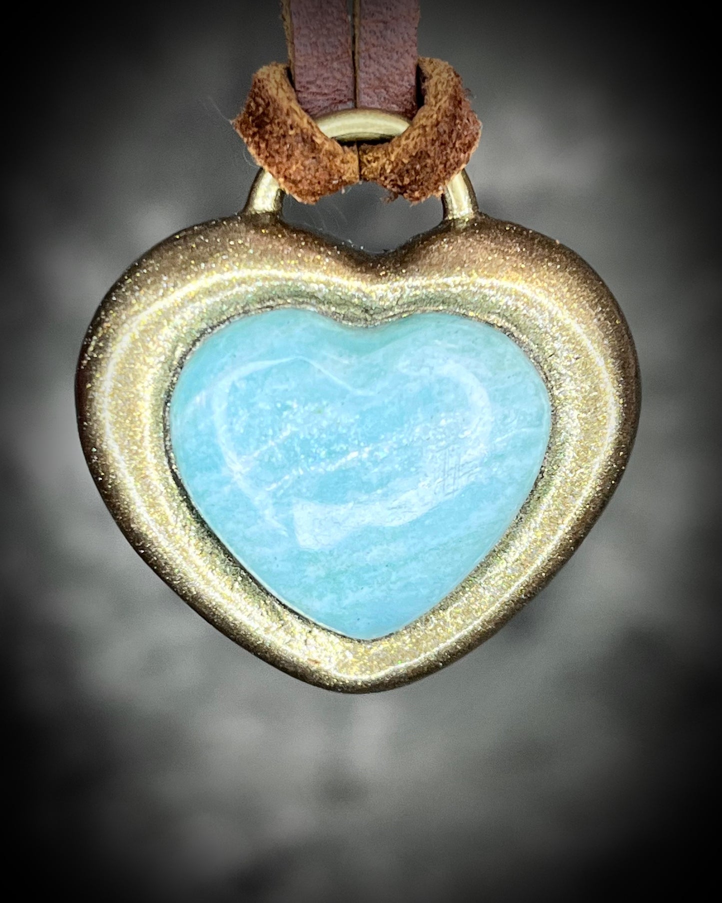 Amazonite crystal heart pendant necklace in gold or silver finish on brown leather cord — handmade bohemian crystal jewelry gift for her.
