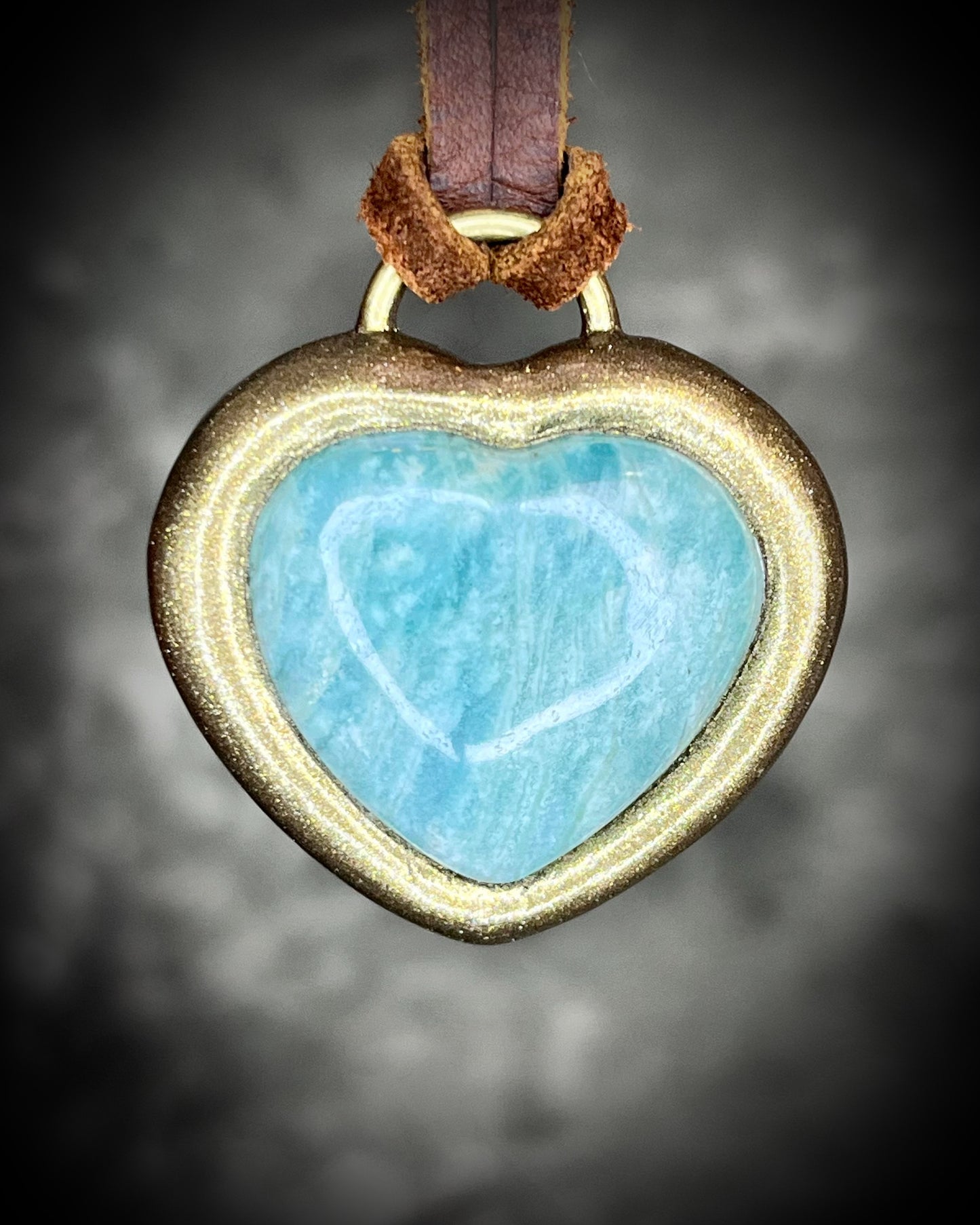 Amazonite crystal heart pendant necklace in gold or silver finish on brown leather cord — handmade bohemian crystal jewelry gift for her.