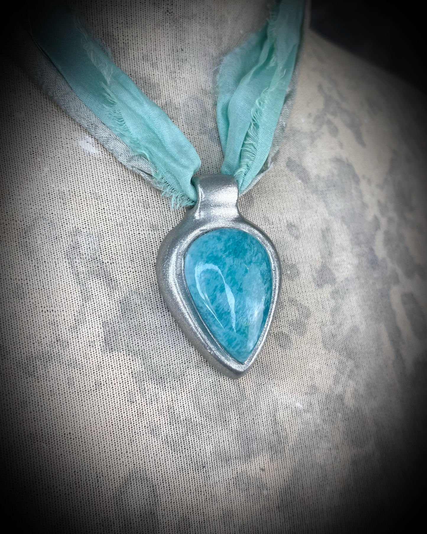Amazonite handmade crystal healing gift for calm and balance.  Silver teardrop gemstone necklace hung from recycled silk for summer, festival, travel, pregnancy jewelry or boho everyday magic.
