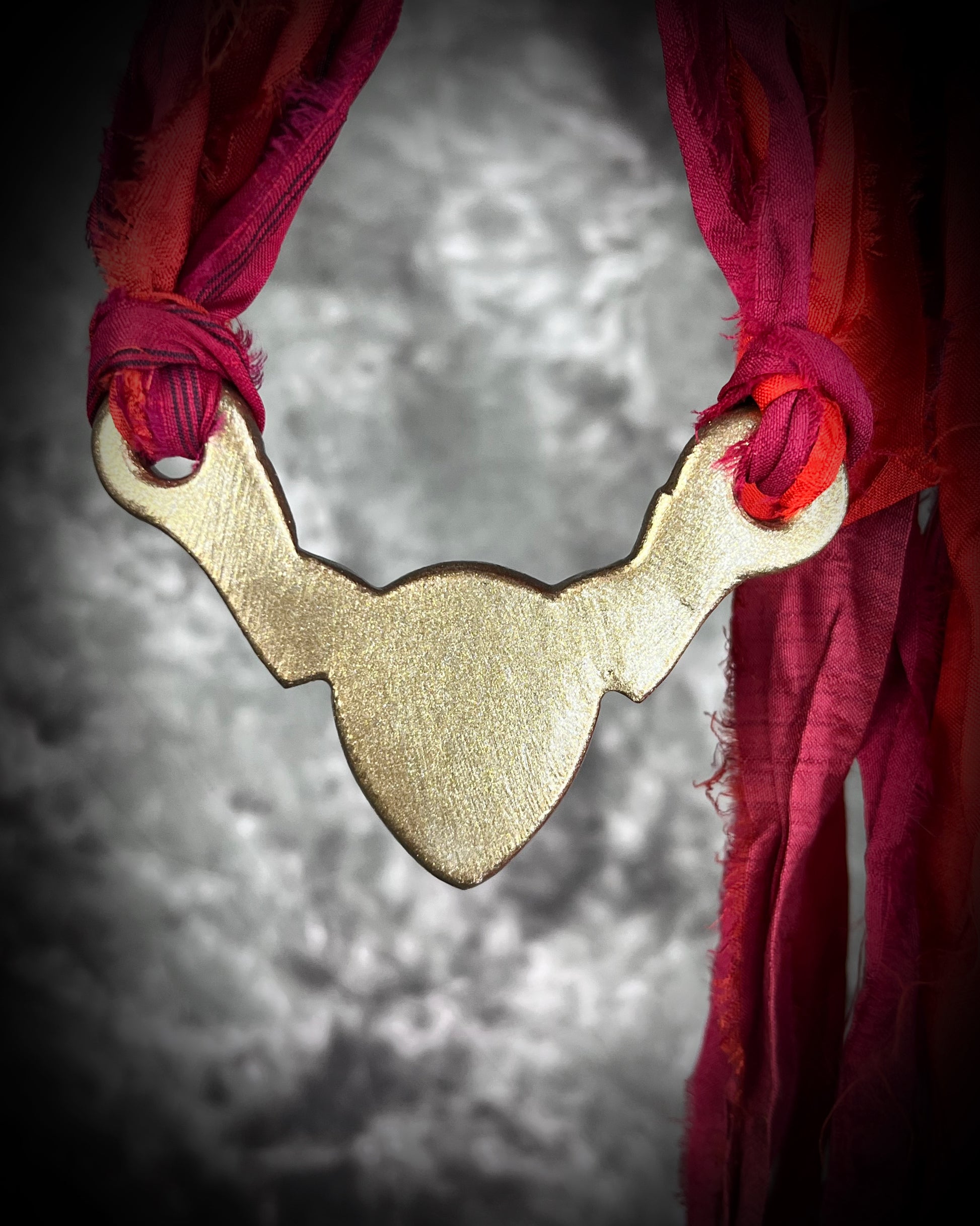 Amethyst and Garnet Birthstone Crystal Healing Collar Talisman – A regal gift for 2026 that enhances inner peace, psychic channels, and protection. Handcrafted in the USA and hung from red recycled silk for the sustainable Queen.